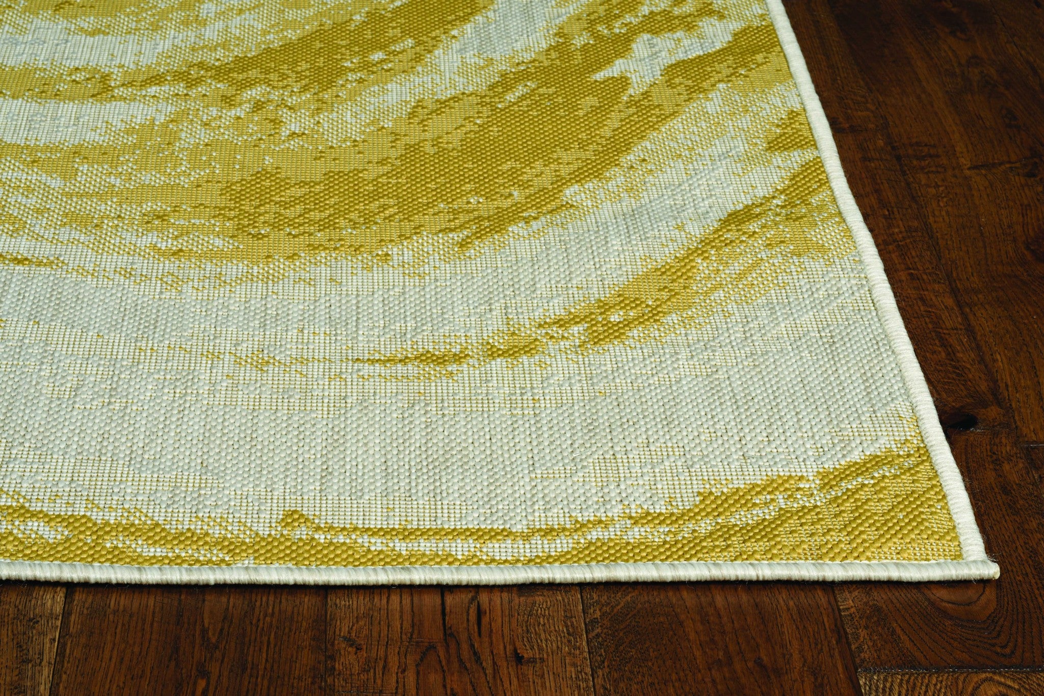 3x4 inches Ivory or Gold Polypropylene Area Rug with textured patterns, suitable for indoor and outdoor use.