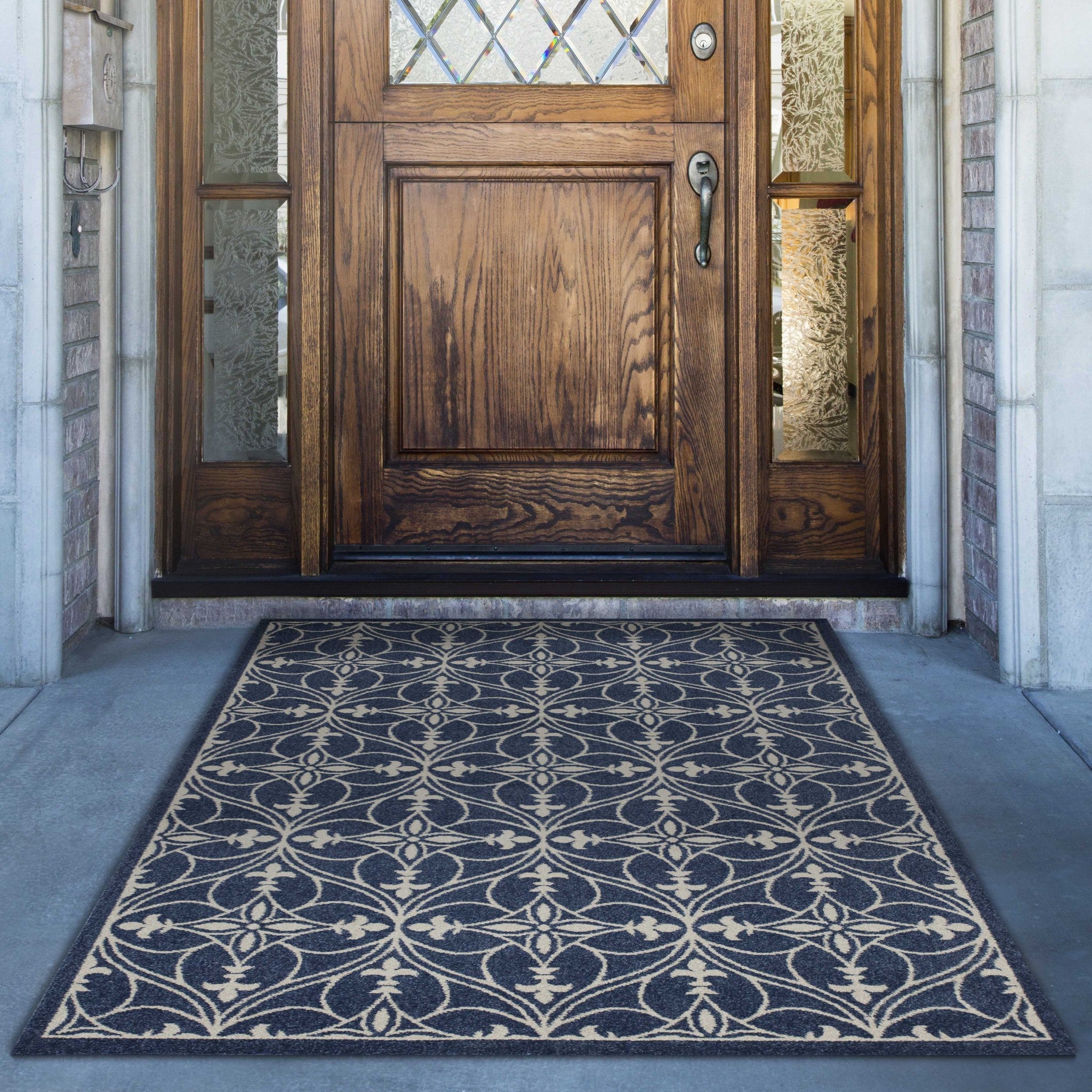 3x5 denim blue area rug made of UV treated polypropylene, showcasing elegant patterns and a soft texture.