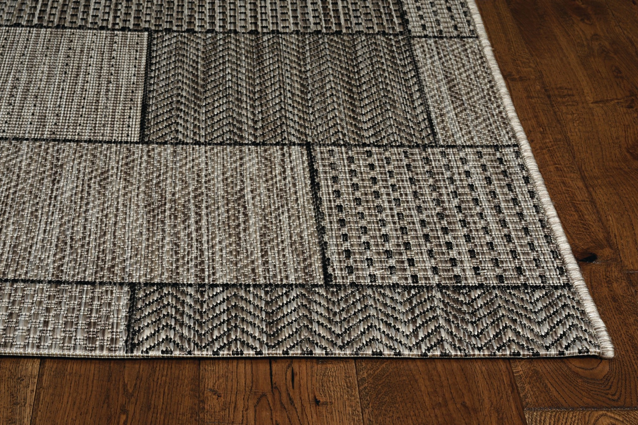 3x5 inches grey machine woven UV treated geometric blocks indoor/outdoor rug with modern design and low pile height.