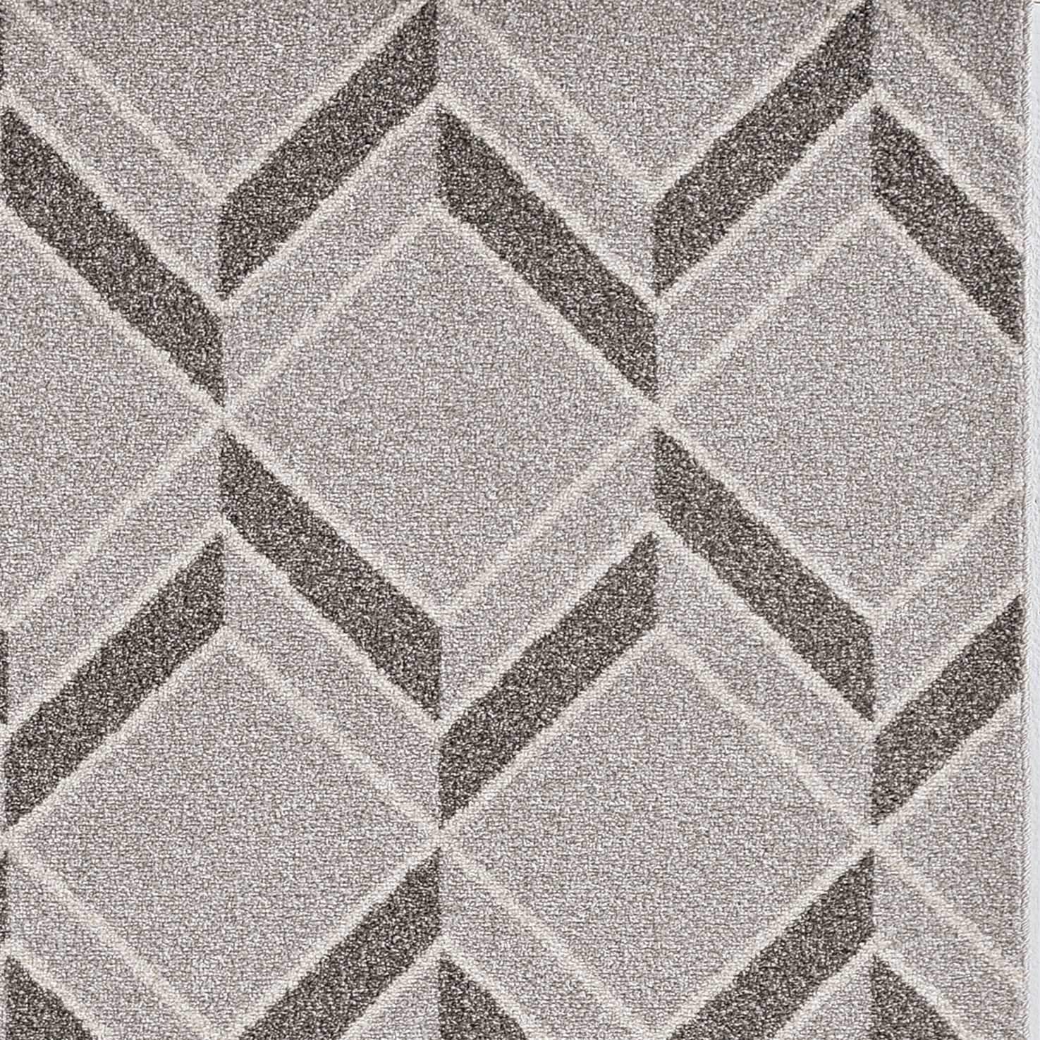 3x5 grey machine woven outdoor rug featuring a herringbone pattern, designed for durability and elegance in indoor and outdoor settings.