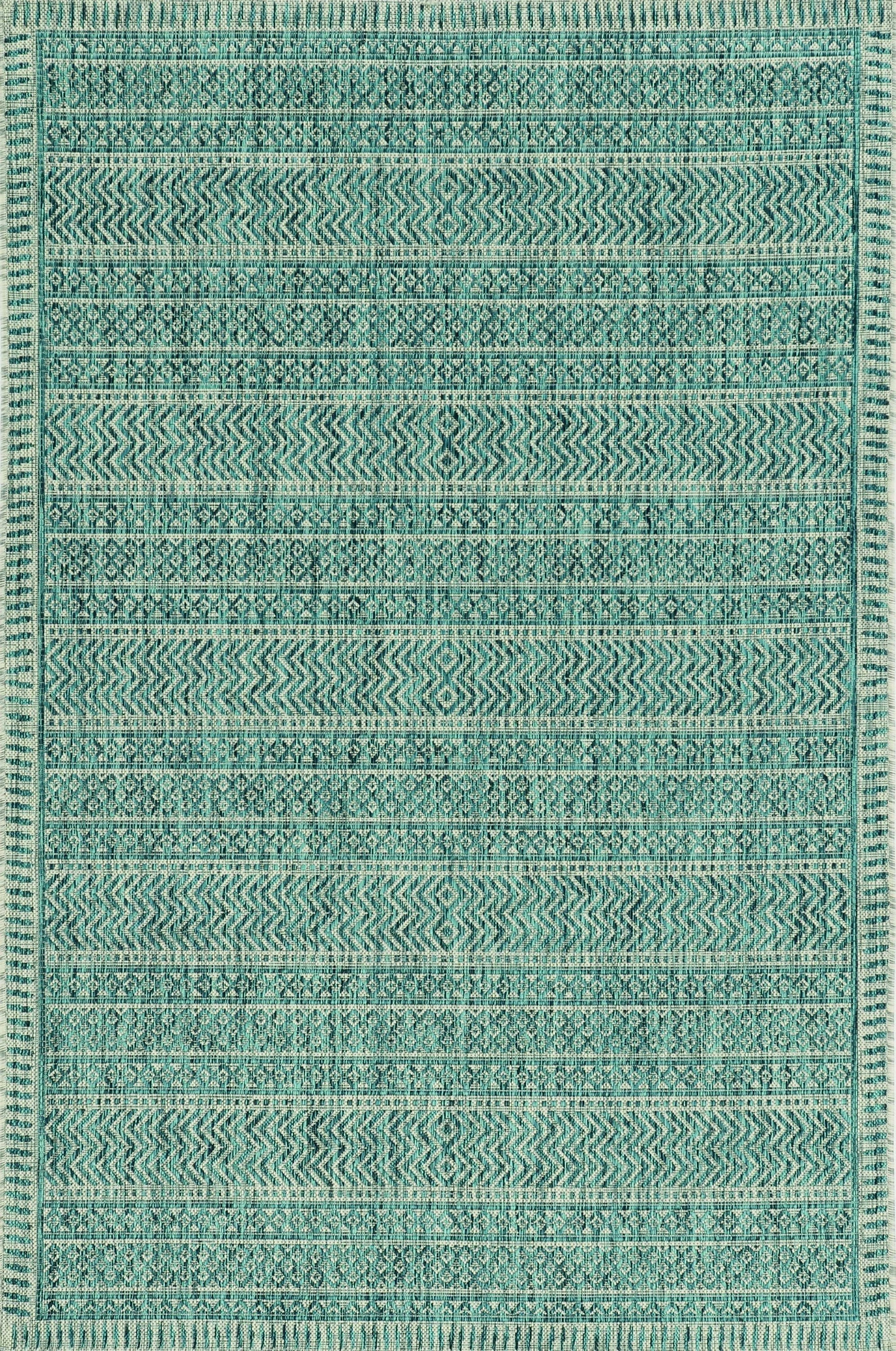 Teal tribal indoor outdoor rug, machine woven, UV treated, showcasing vibrant colors and patterns, perfect for enhancing any space.