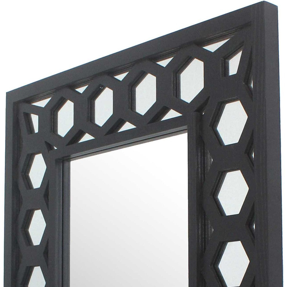 A stylish black vintage dressing mirror with a wooden frame, featuring a rectangular shape and lattice design, perfect for makeup and grooming.