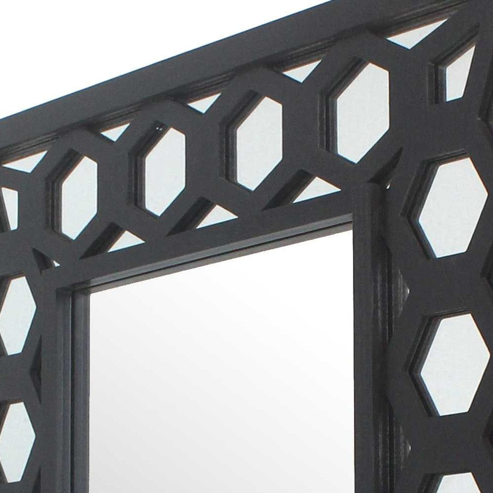 A stylish black vintage dressing mirror with a wooden frame, featuring a rectangular shape and lattice design, perfect for makeup and grooming.