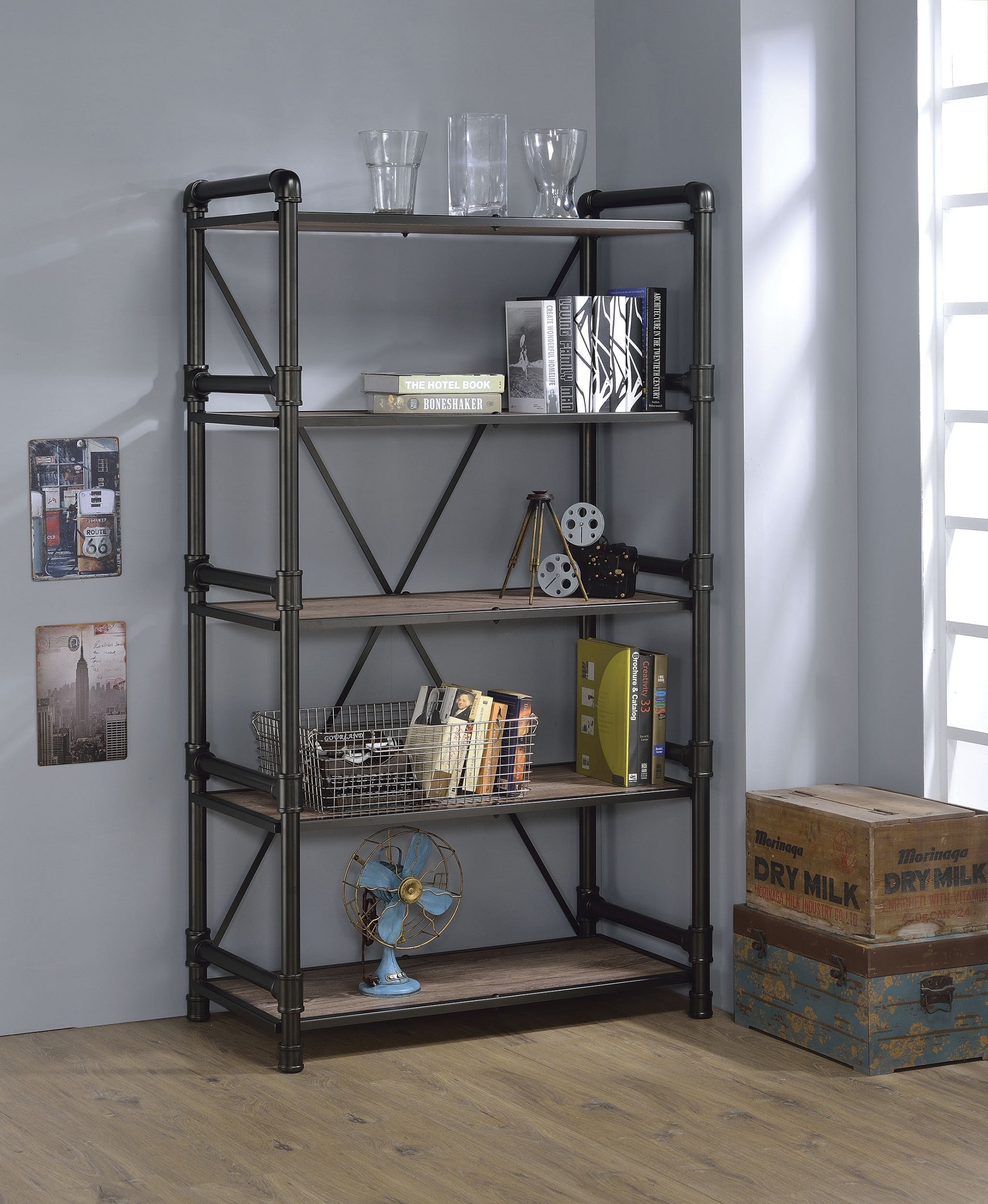 A rustic oak and black particle board bookshelf, 40x22x72 inches, showcasing books and decorative items in a stylish setting.