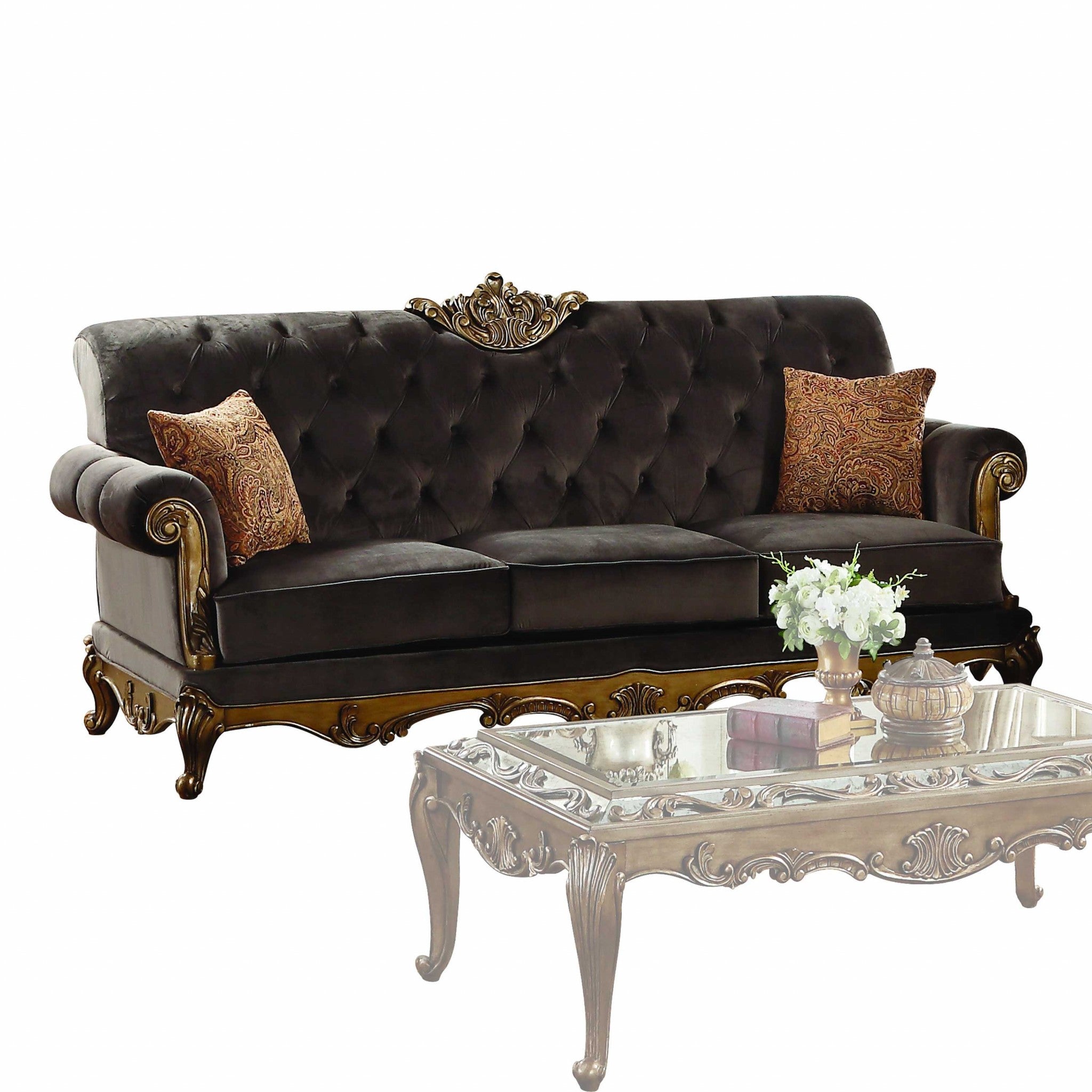 Elegant 41x94 inches charcoal fabric upholstery with antique gold accents, featuring button tufted backrest and detailed wooden legs.