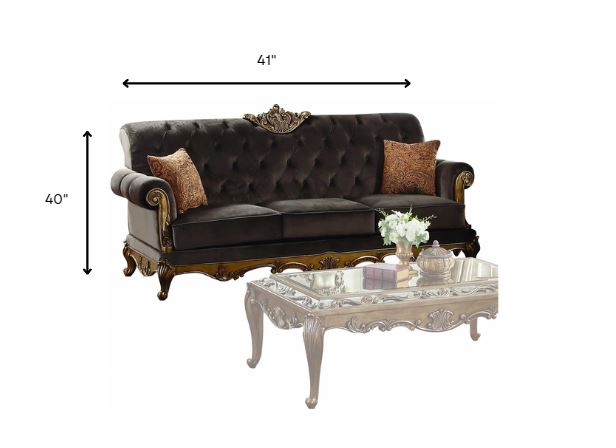 Elegant 41x94 inches charcoal fabric upholstery with antique gold accents, featuring button tufted backrest and detailed wooden legs.