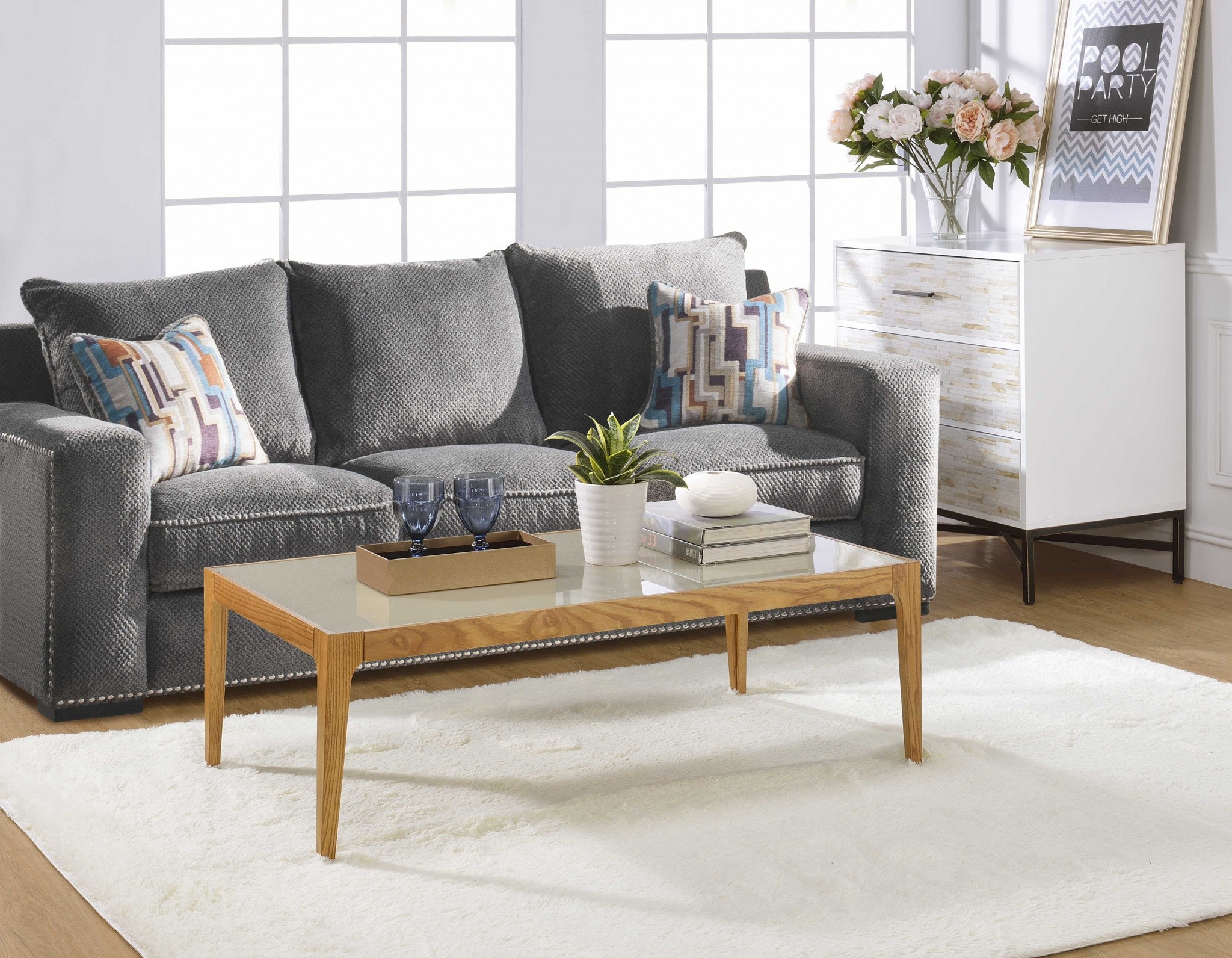 A stylish 43x24x15 inches natural and frost glass coffee table featuring a frosted glass top and wooden tapered legs, perfect for modern living rooms.