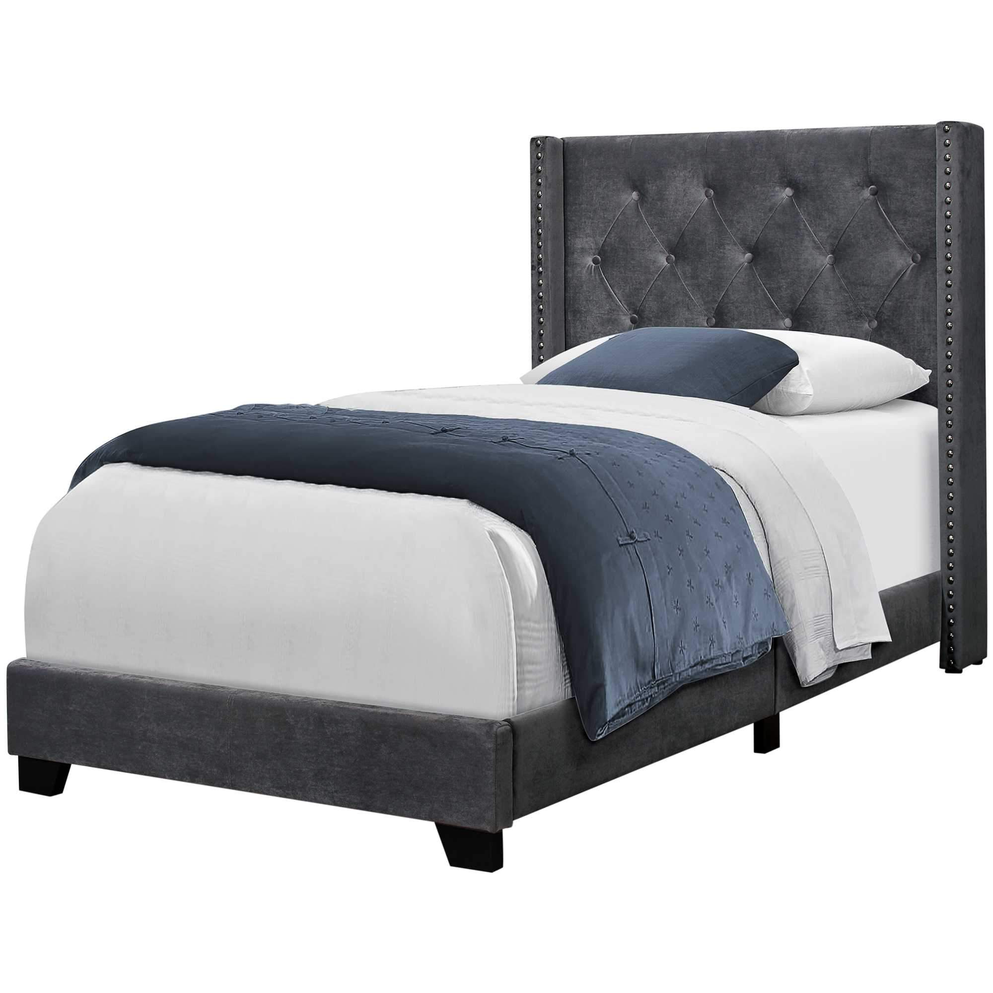 Luxurious twin size bed frame in dark grey velvet with chrome nail head trim and wingback headboard.