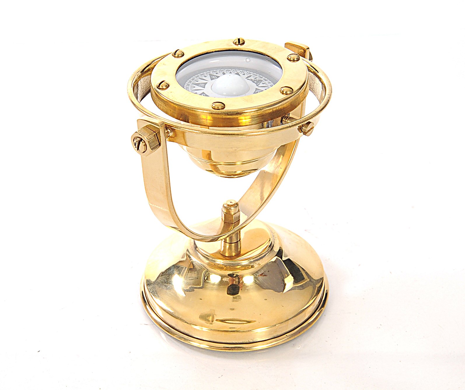 A beautifully crafted gimbaled compass made of high-quality brass with a shiny finish, measuring 4.5 inches wide, 5 inches long, and 5.5 inches high.