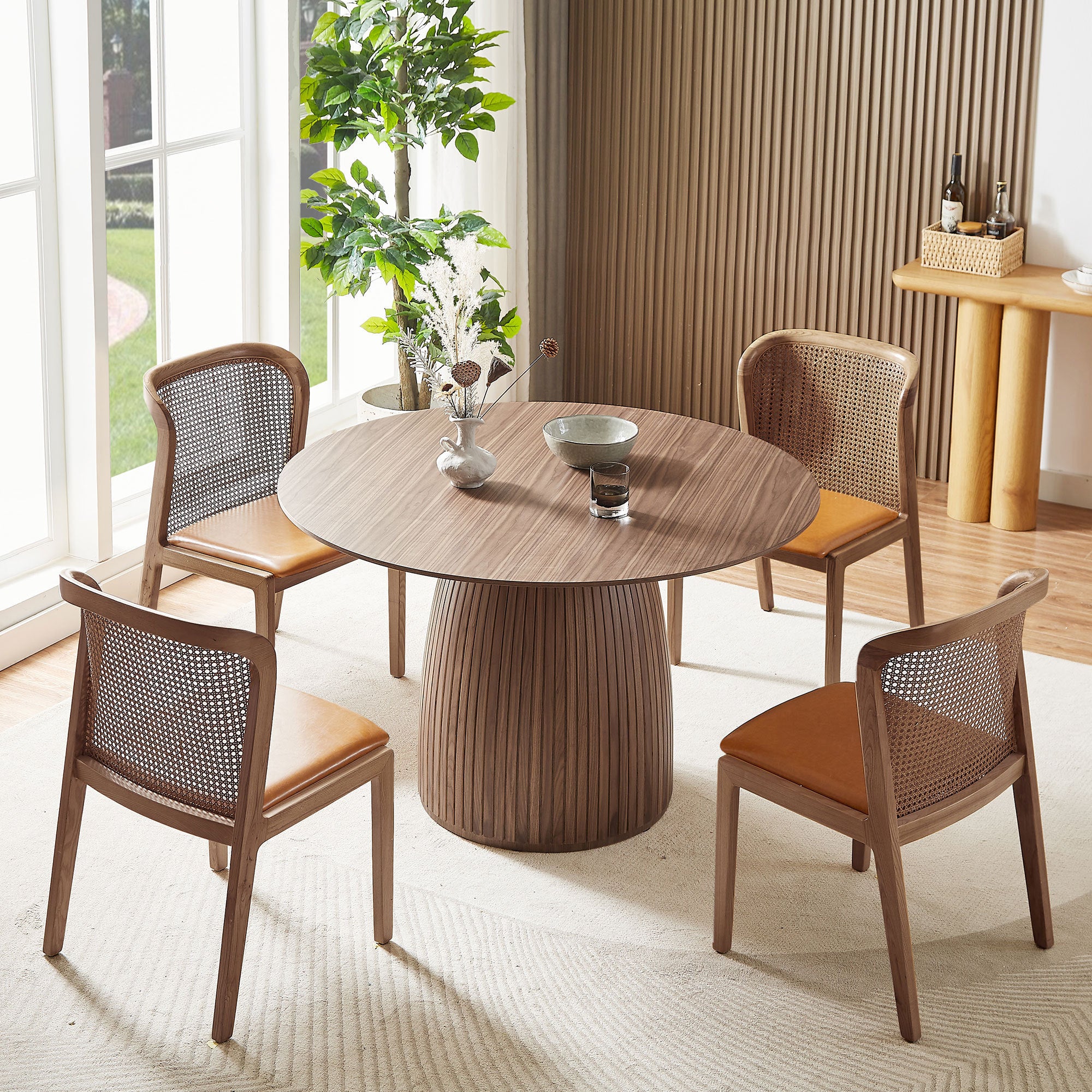 A stylish 47.24 inch round dining table with a walnut finish, designed for 4-6 people, suitable for dining rooms and small spaces.