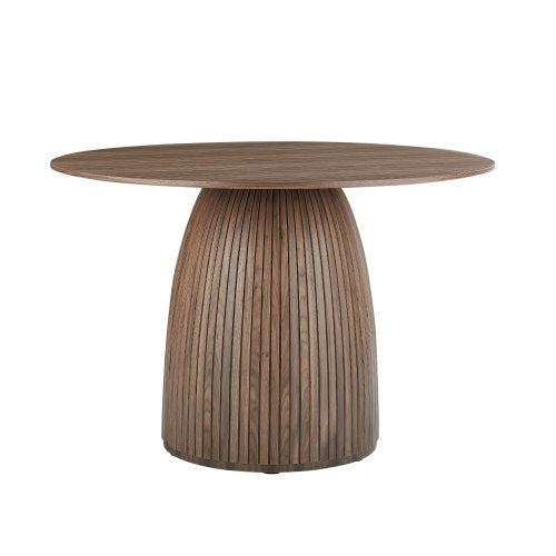 A stylish 47.24 inch round dining table with a walnut MDF top, suitable for 4-6 people, set in a cozy dining room.