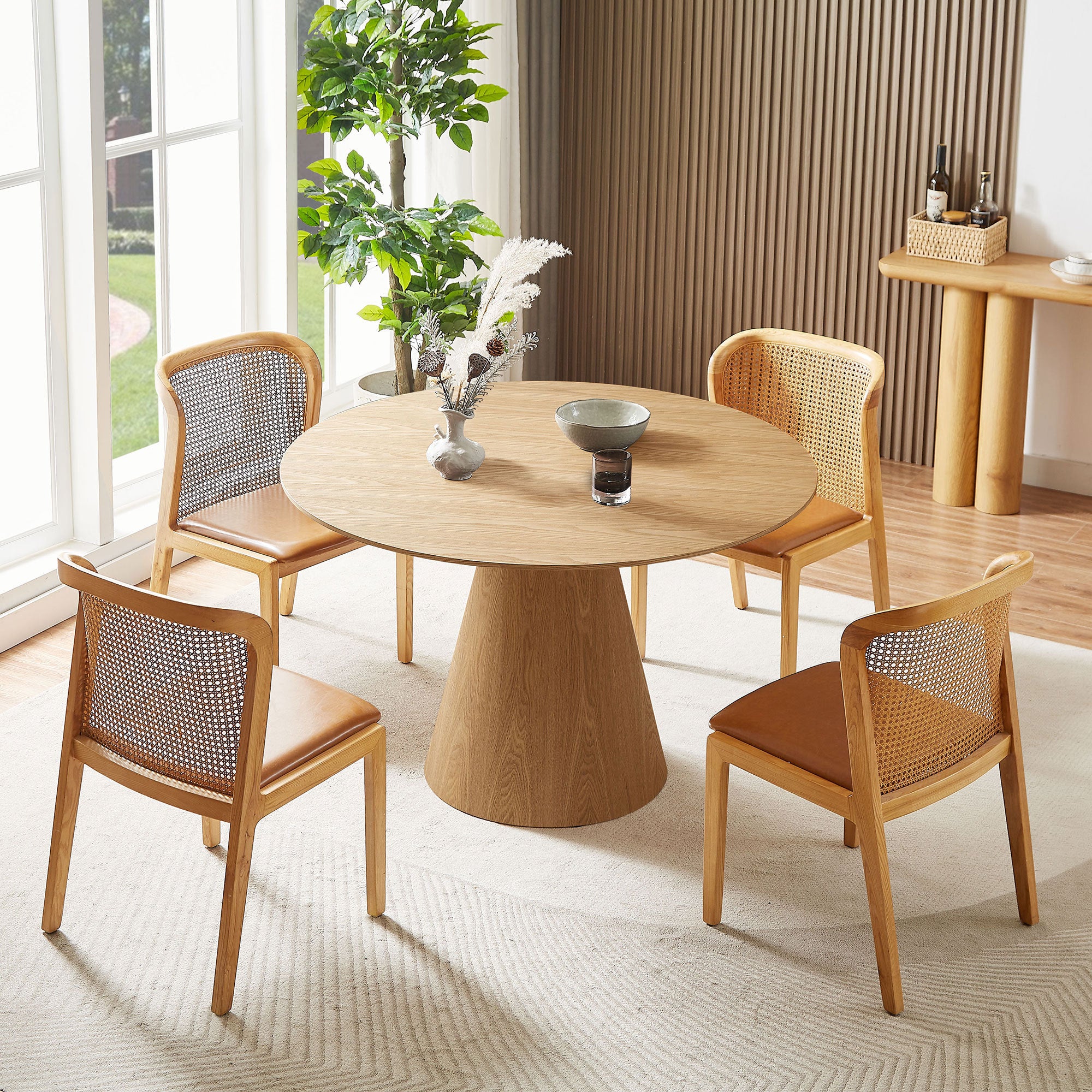 A stylish 47.24'' round wooden dining table made from hardwood solids, featuring a natural ash finish, perfect for dining rooms or kitchens.