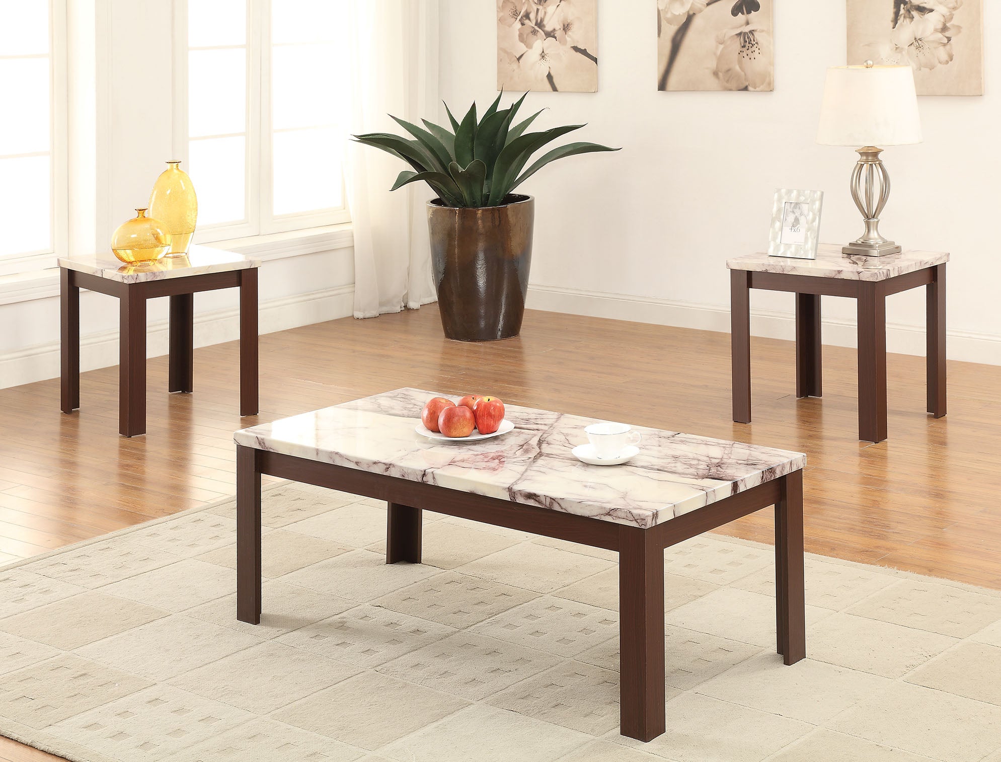 A stylish 3Pc coffee table set featuring faux marble tops and cherry wood legs, perfect for modern living rooms.