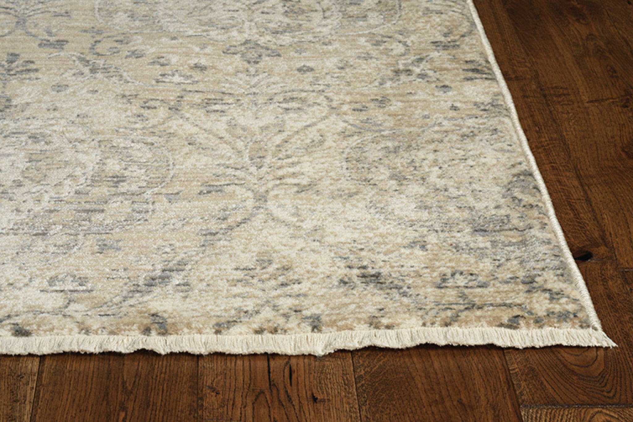 4x6 sand grey machine woven distressed vintage traditional rug, showcasing intricate patterns and a rustic design.