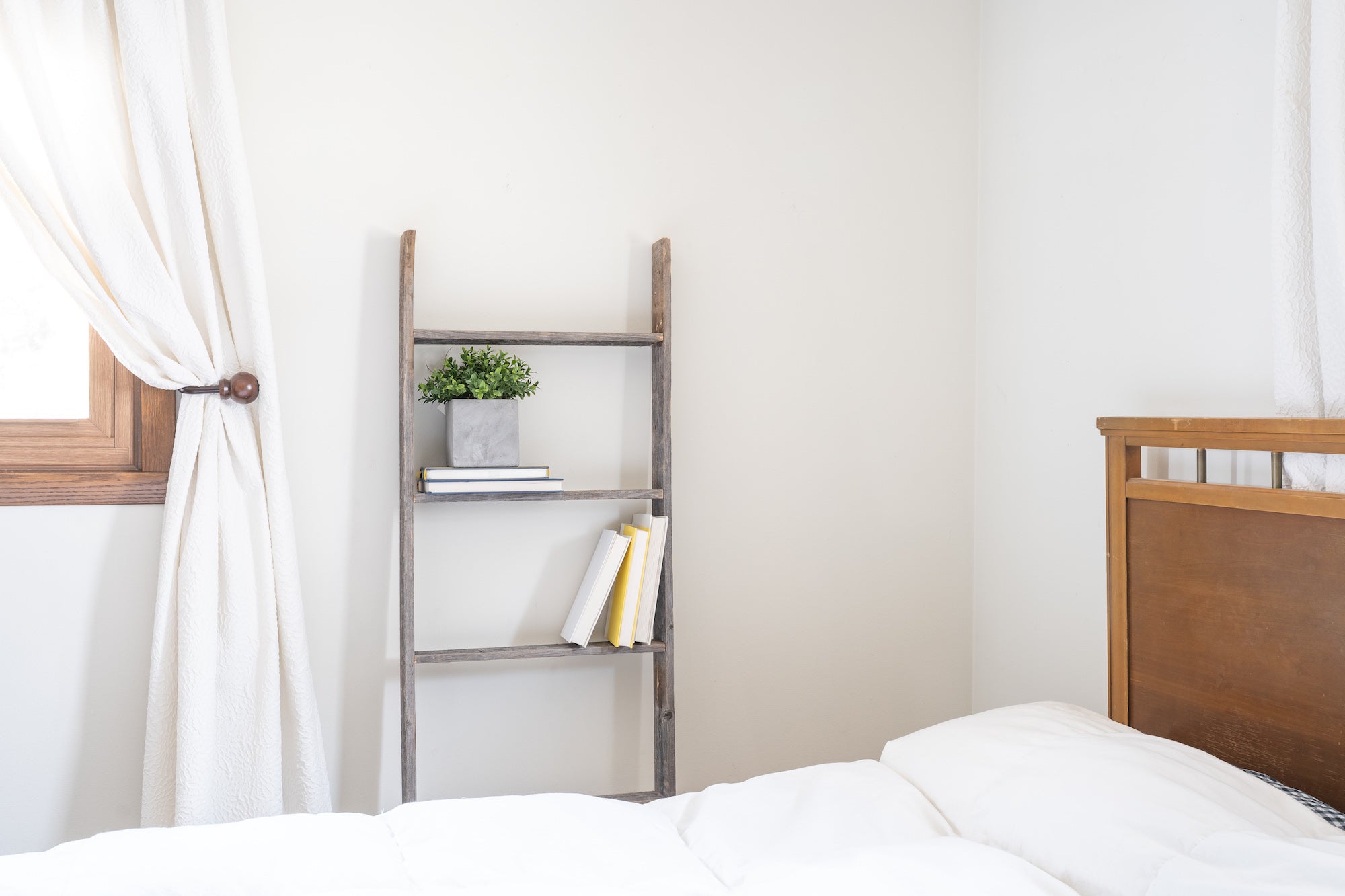 5 Step Rustic Weathered Grey Wood Ladder Shelf showcasing its unique handcrafted design and reclaimed wood finish.