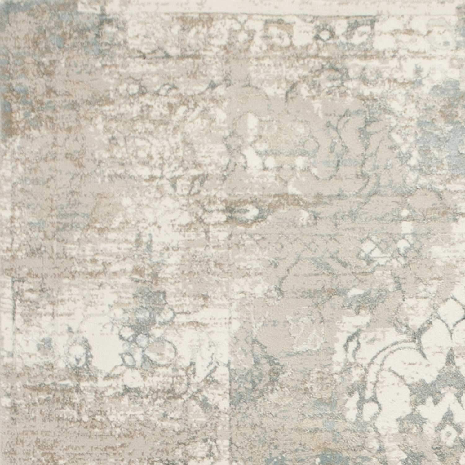 5' x 7' Polypropylene Ivory Area Rug with a soft texture and metallic luster, perfect for enhancing home decor.