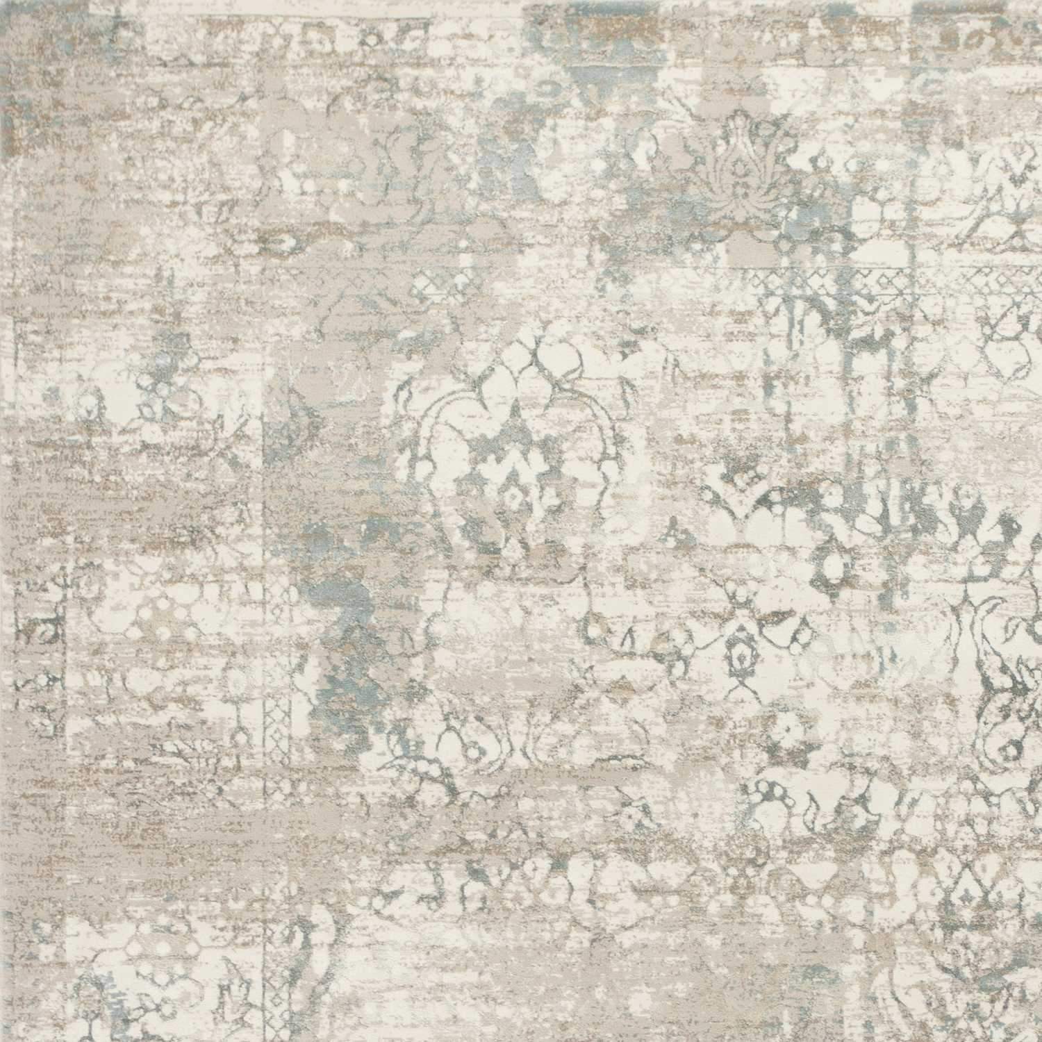 5' x 7' Polypropylene Ivory Area Rug with a soft texture and metallic luster, perfect for enhancing home decor.