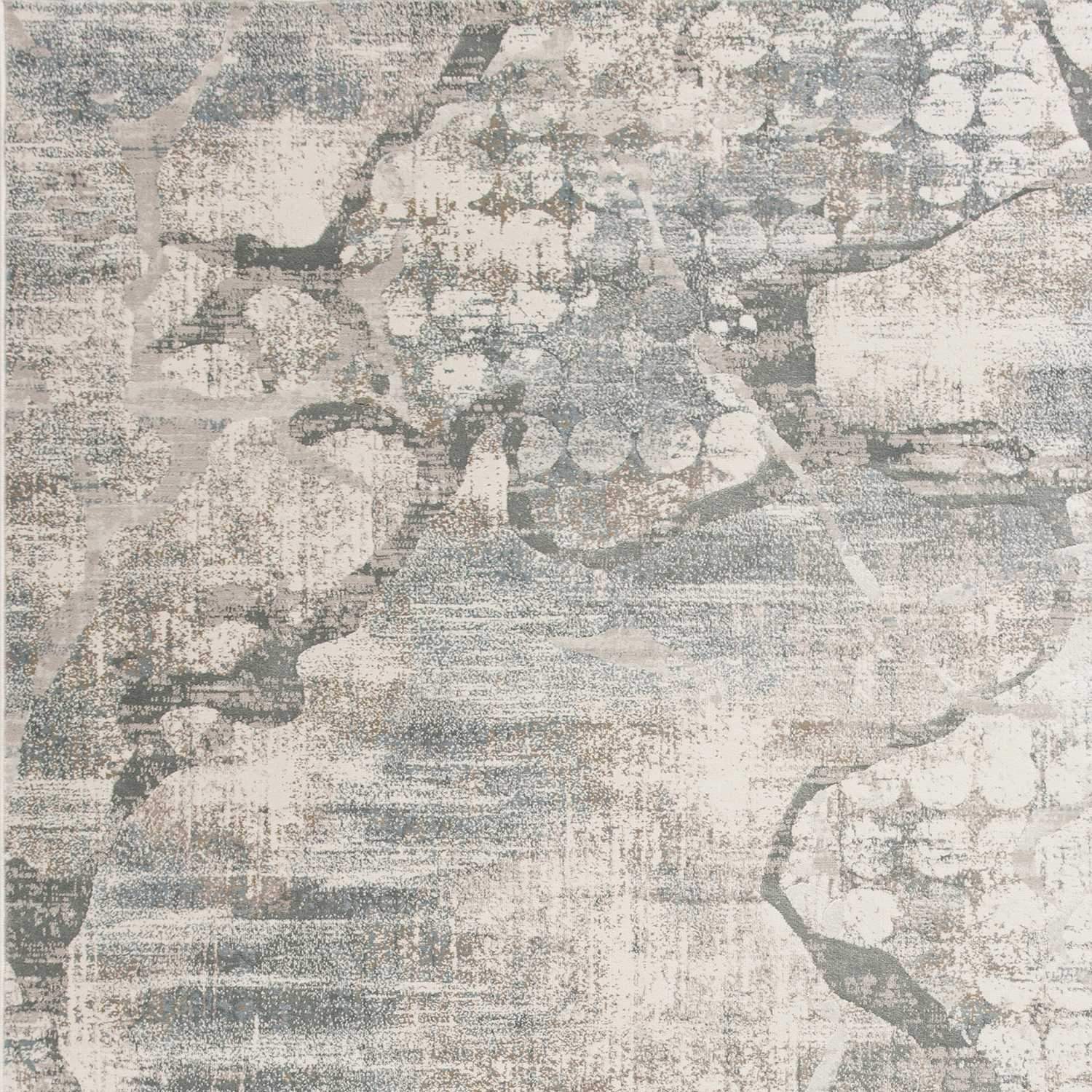 5' x 7' Polypropylene Ivory or Mist Area Rug featuring a metallic luster and elegant design, perfect for enhancing home decor.