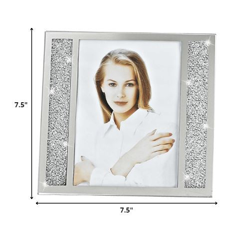 A beautiful 5 x 7 silver crystalized picture frame showcasing a photo, featuring a hand-crafted design that sparkles elegantly.