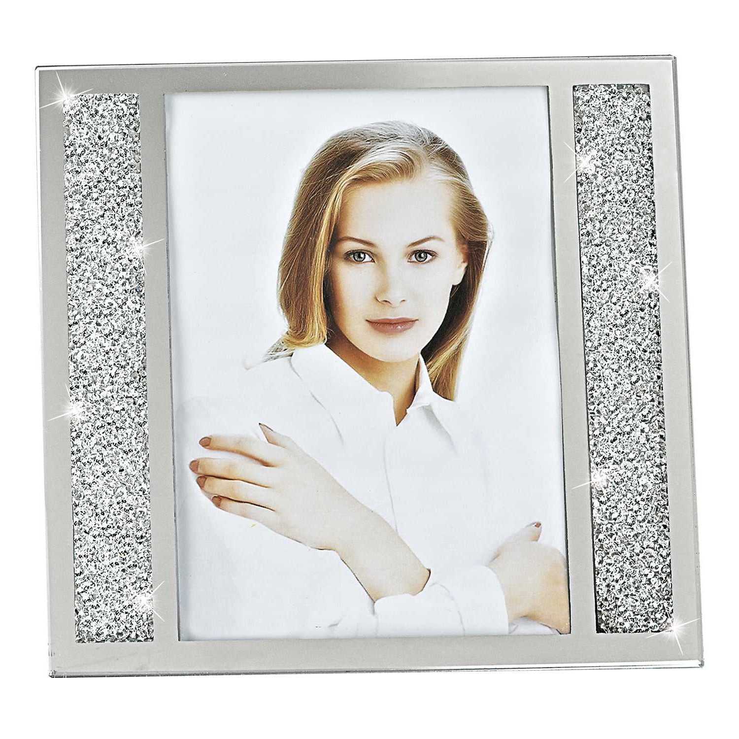 A beautiful 5 x 7 silver crystalized picture frame showcasing a photo, featuring a hand-crafted design that sparkles elegantly.