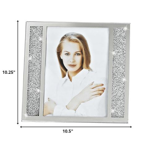 A beautiful 5 x 7 silver crystalized picture frame showcasing a photo, featuring a hand-crafted design that sparkles elegantly.