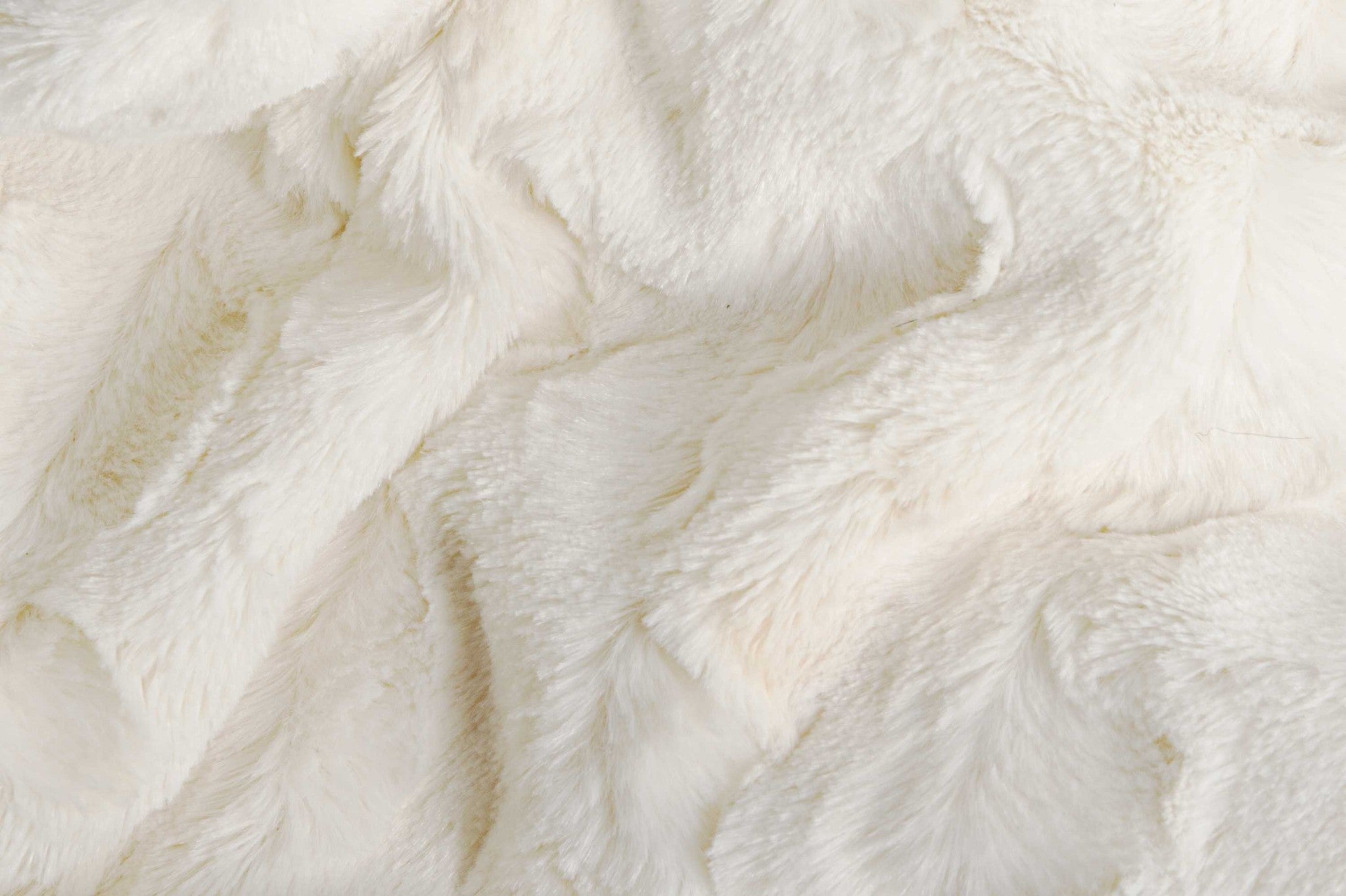 50x60 inches Reno Off White Fur Throw, showcasing its plush texture and elegant off-white color, perfect for home decor.