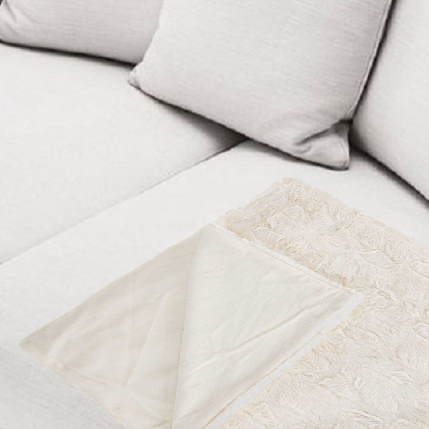 50x60 inches Reno Off White Fur Throw, showcasing its plush texture and elegant off-white color, perfect for home decor.