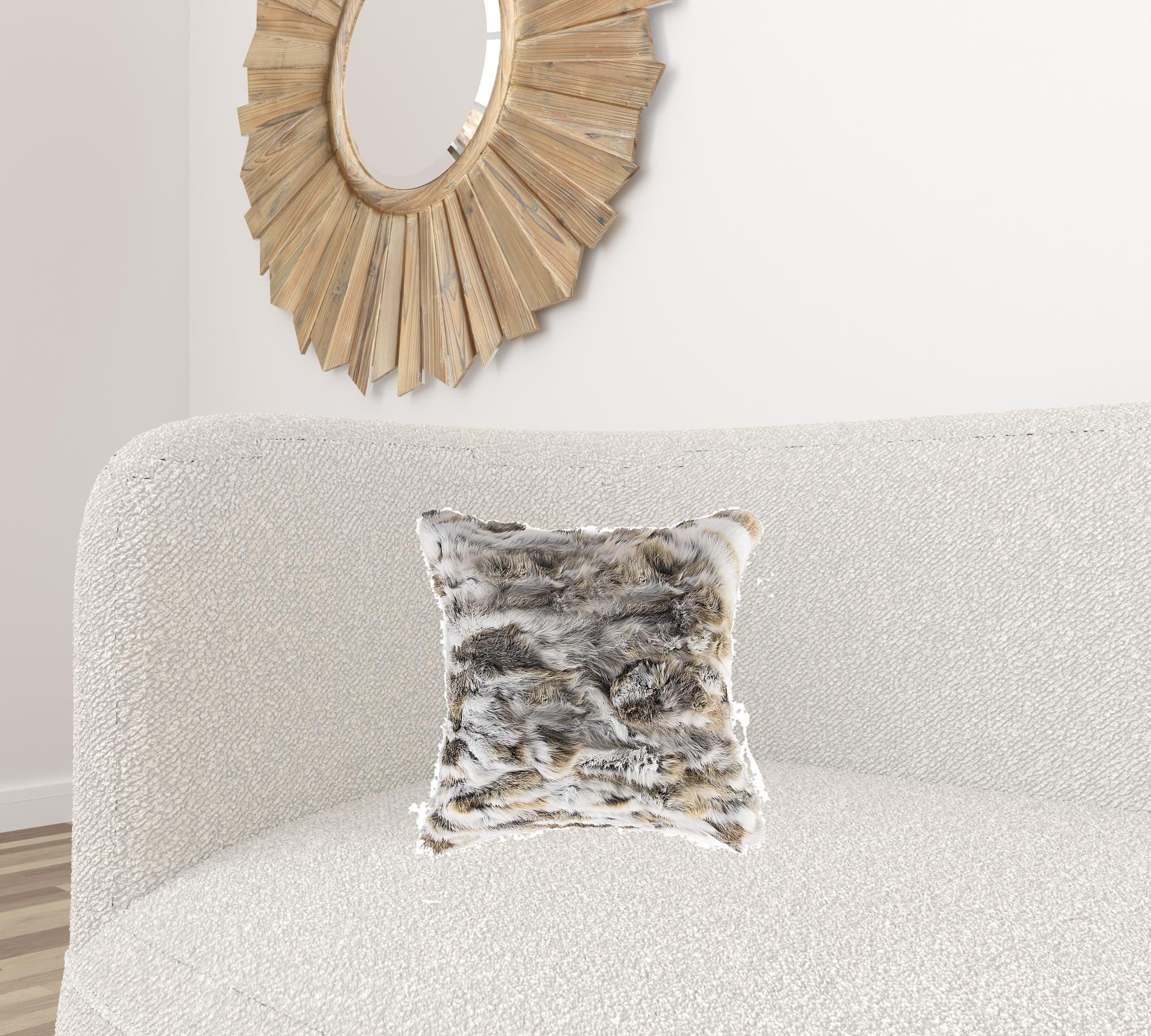 Luxurious 5x18x18 inches tan and white rabbit fur pillow, showcasing its soft texture and elegant design.