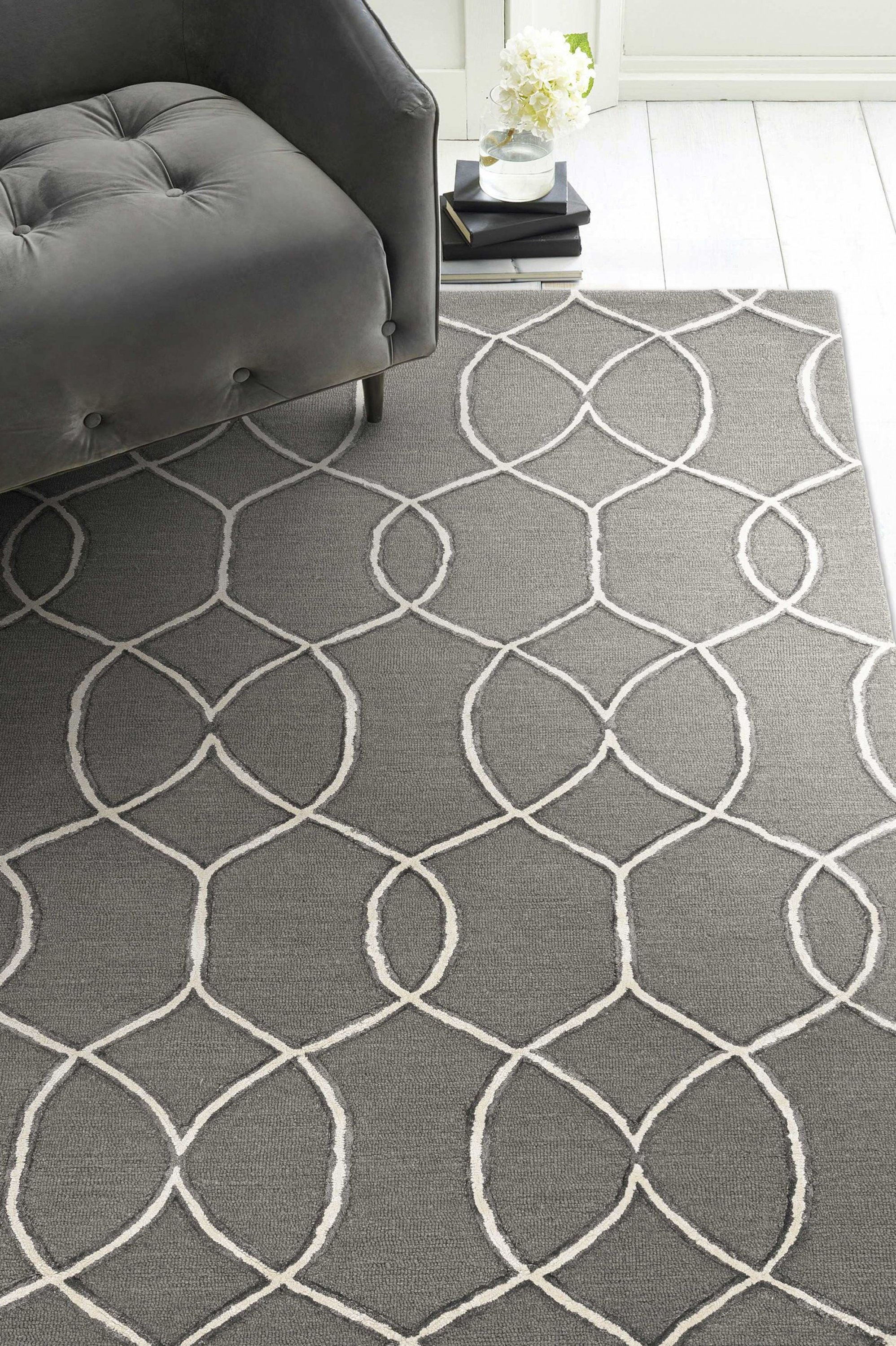 5x7 Charcoal Trellis Wool Indoor Area Rug featuring intricate patterns and a soft texture, perfect for enhancing home decor.