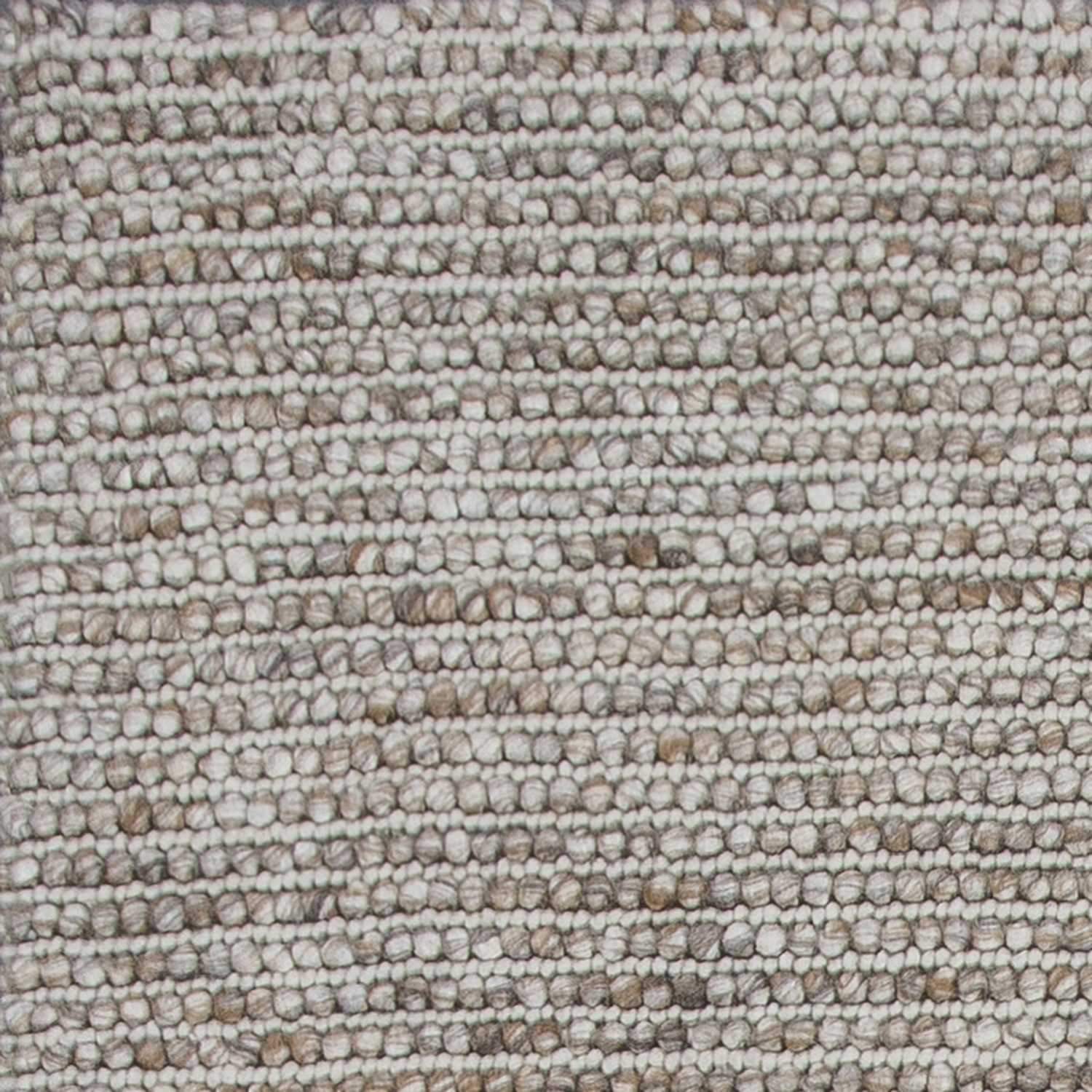 5x7 natural wool boucle Berber style area rug with a soft, nobby texture in neutral tones, perfect for living room decor.