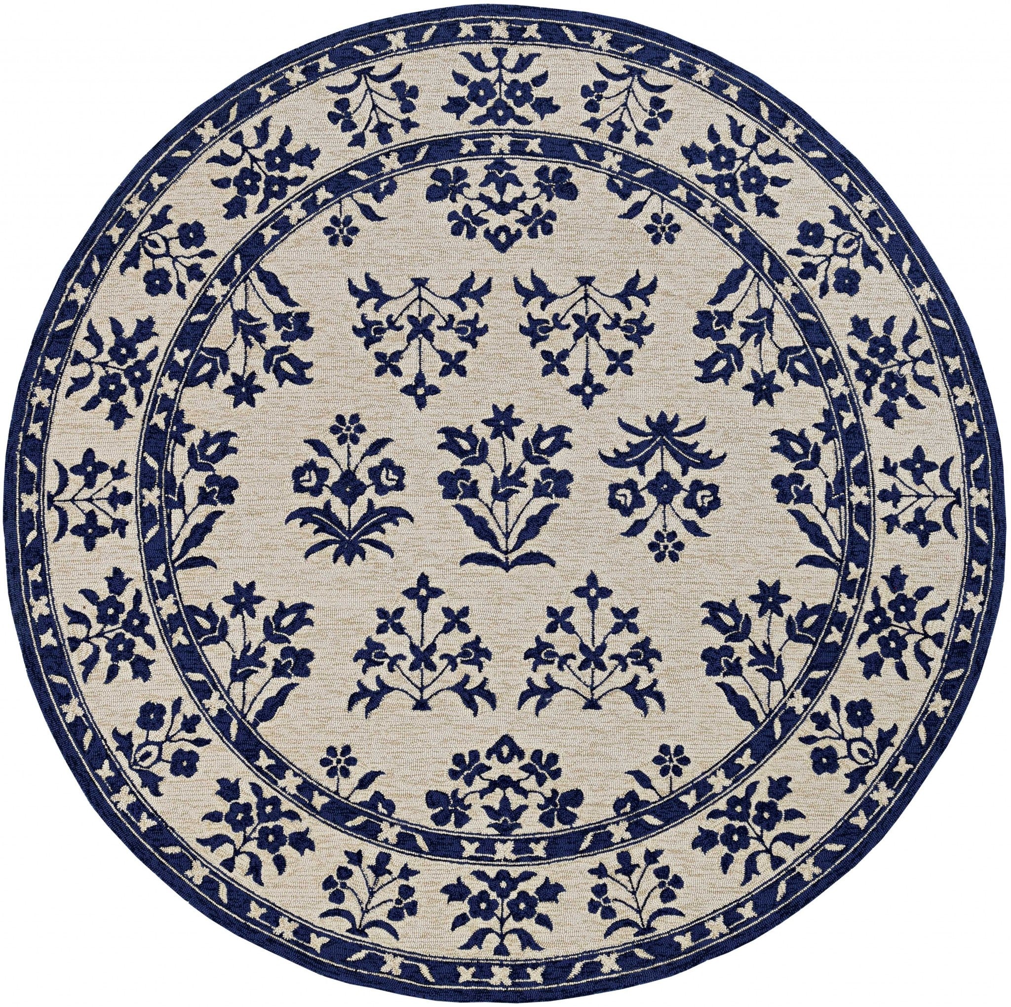 5x7 sand and blue floral bordered area rug, perfect for indoor and outdoor use, showcasing a beautiful floral design.