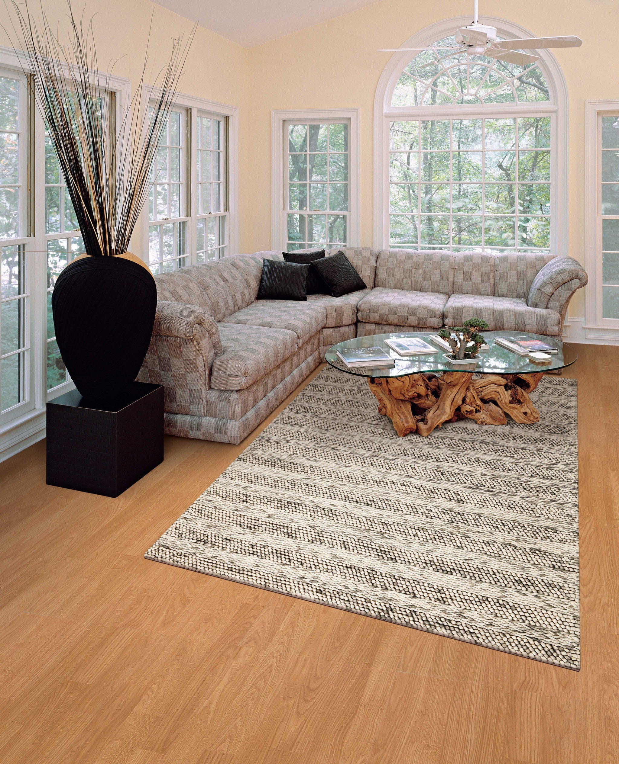 5x7 wool grey area rug with soft texture and elegant design, perfect for contemporary home decor.