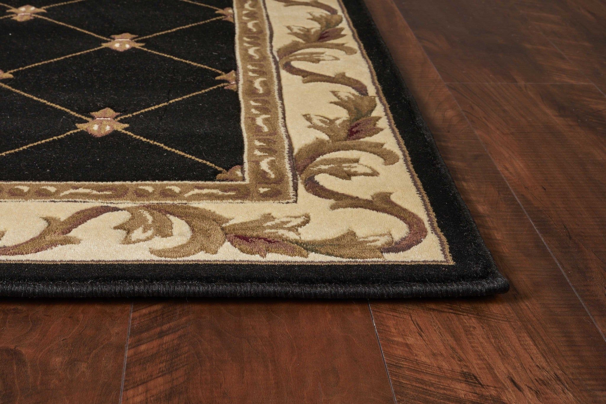 5x8 black fleur-de-lis area rug with diamond border, showcasing intricate patterns and elegant design.