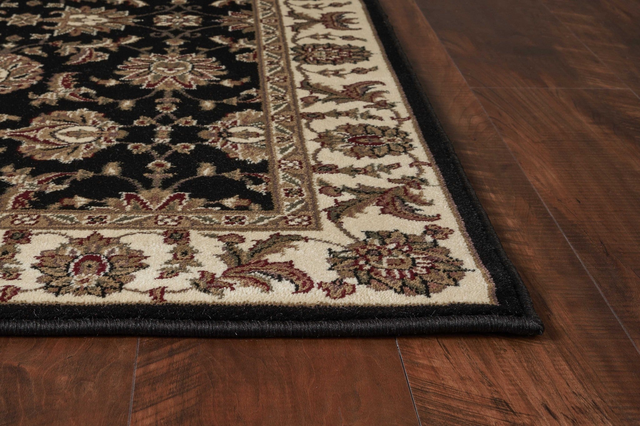 5x8 black and ivory floral bordered area rug showcasing intricate floral patterns and elegant design.