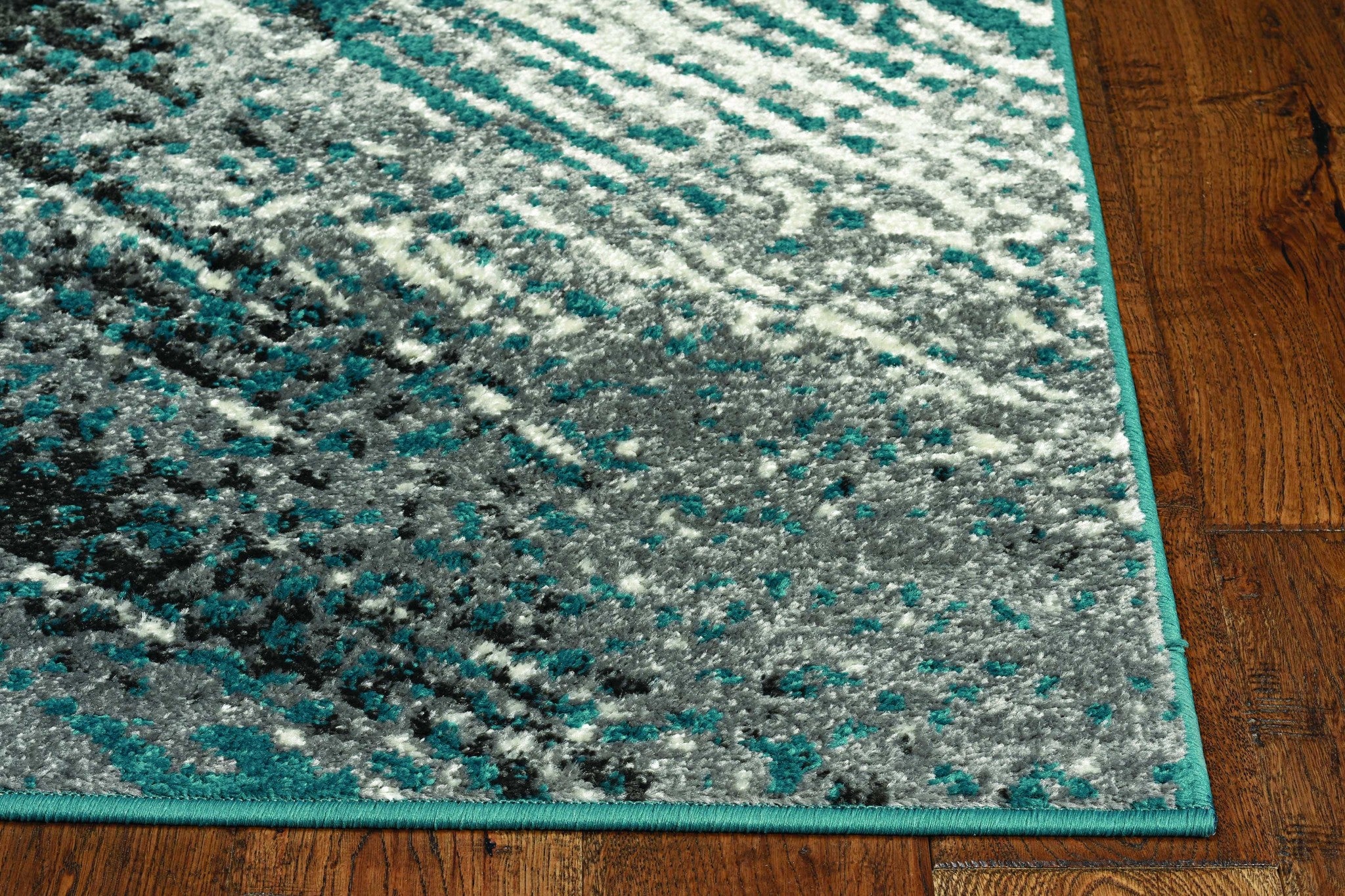 5x8 Grey and Blue Abstract Area Rug, featuring bold patterns and contemporary design, perfect for modern home decor.