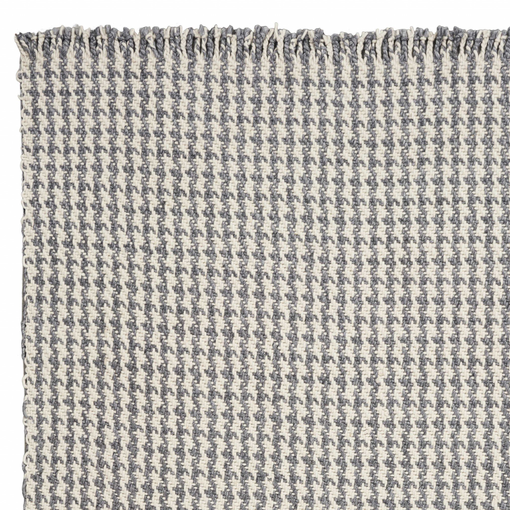 5x8 inches ivory and grey plaid knitted wool indoor area rug with braided fringe, showcasing elegant design and high-quality craftsmanship.