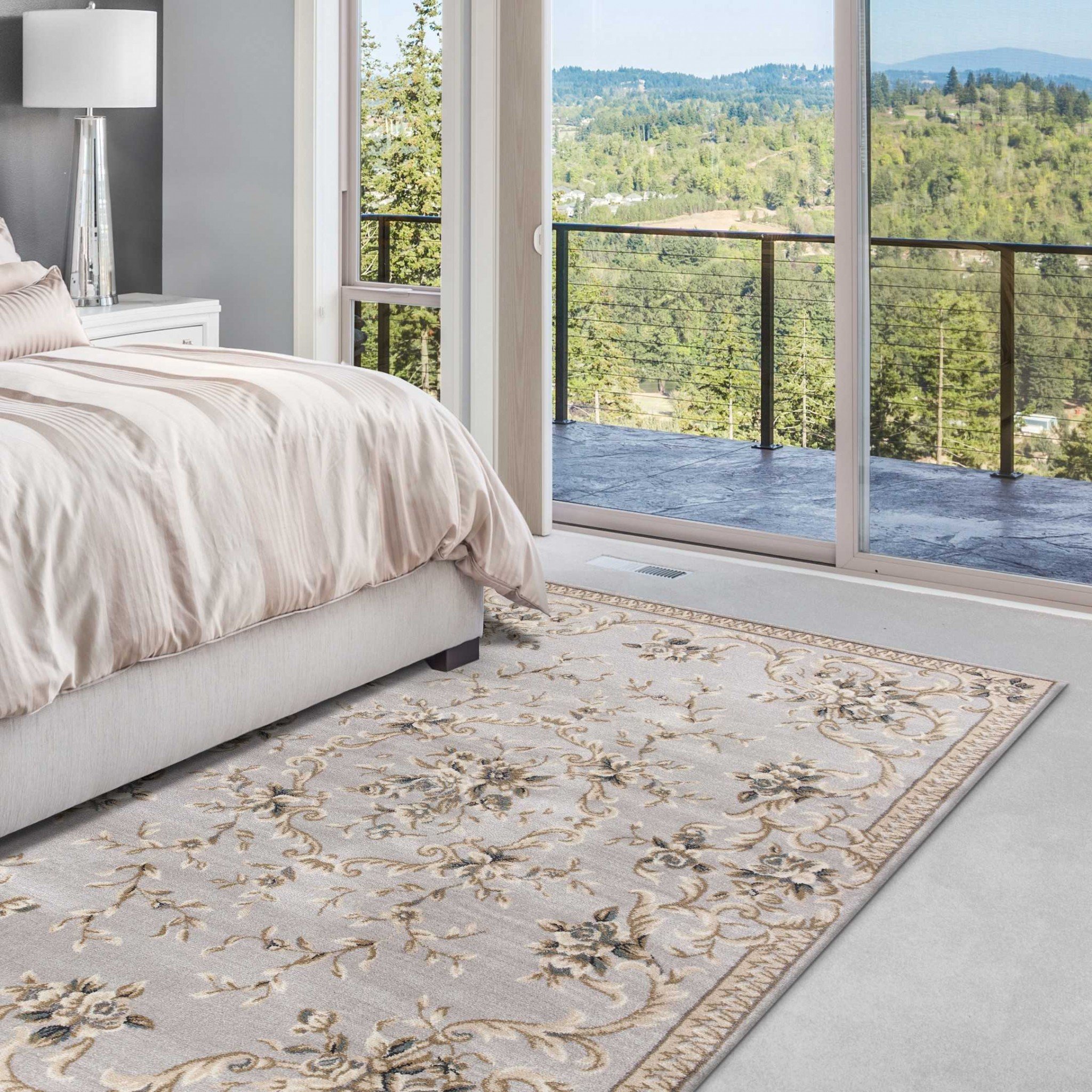 Light grey floral vines bordered area rug, showcasing elegant floral patterns and a modern design, perfect for enhancing home decor.