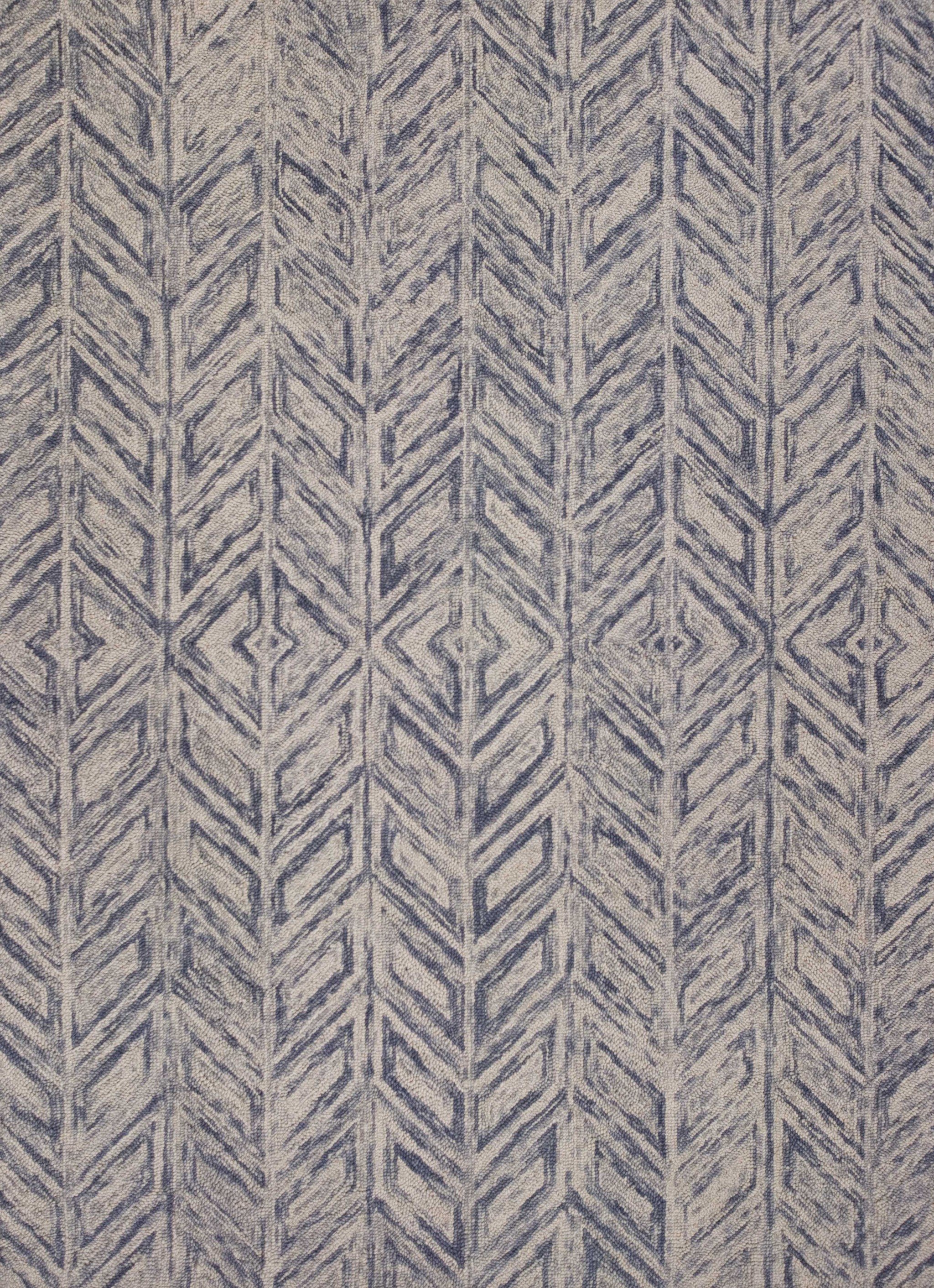 5x7 inches blue hand-tufted wool herringbone indoor area rug showcasing elegant design and quality craftsmanship.