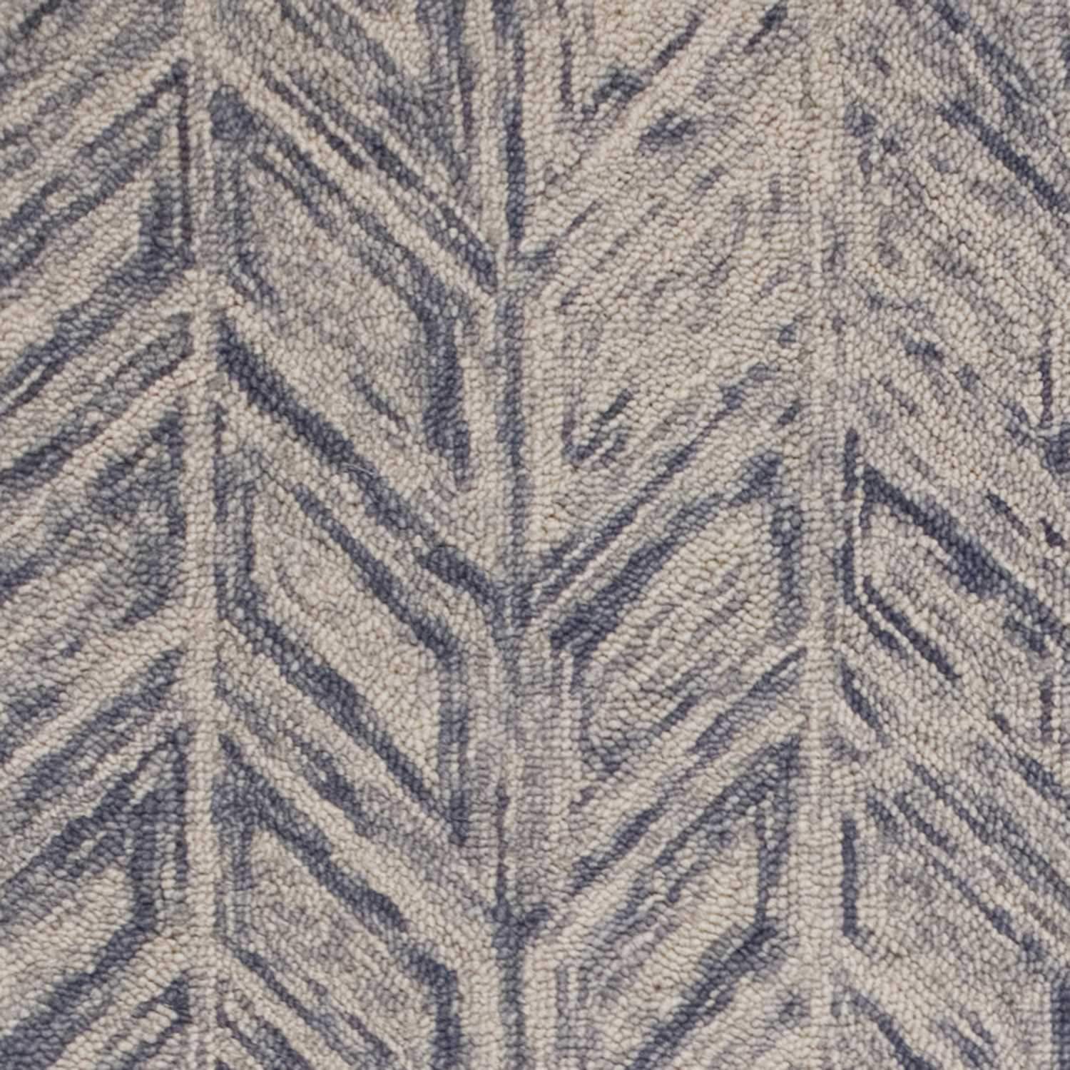 5x7 inches blue hand-tufted wool herringbone indoor area rug showcasing elegant design and quality craftsmanship.