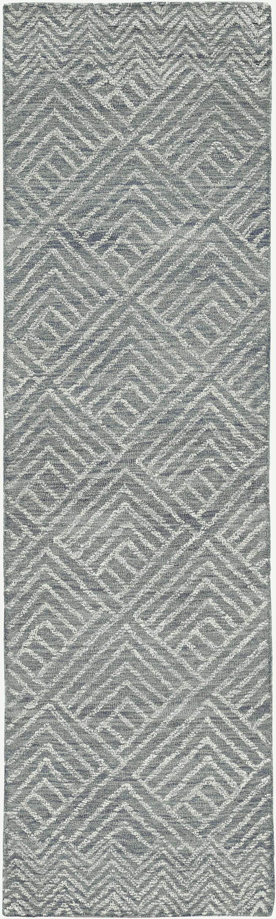 5x7 denim blue hand-tufted geometric indoor rug with space-dyed wool texture, perfect for living room decor.