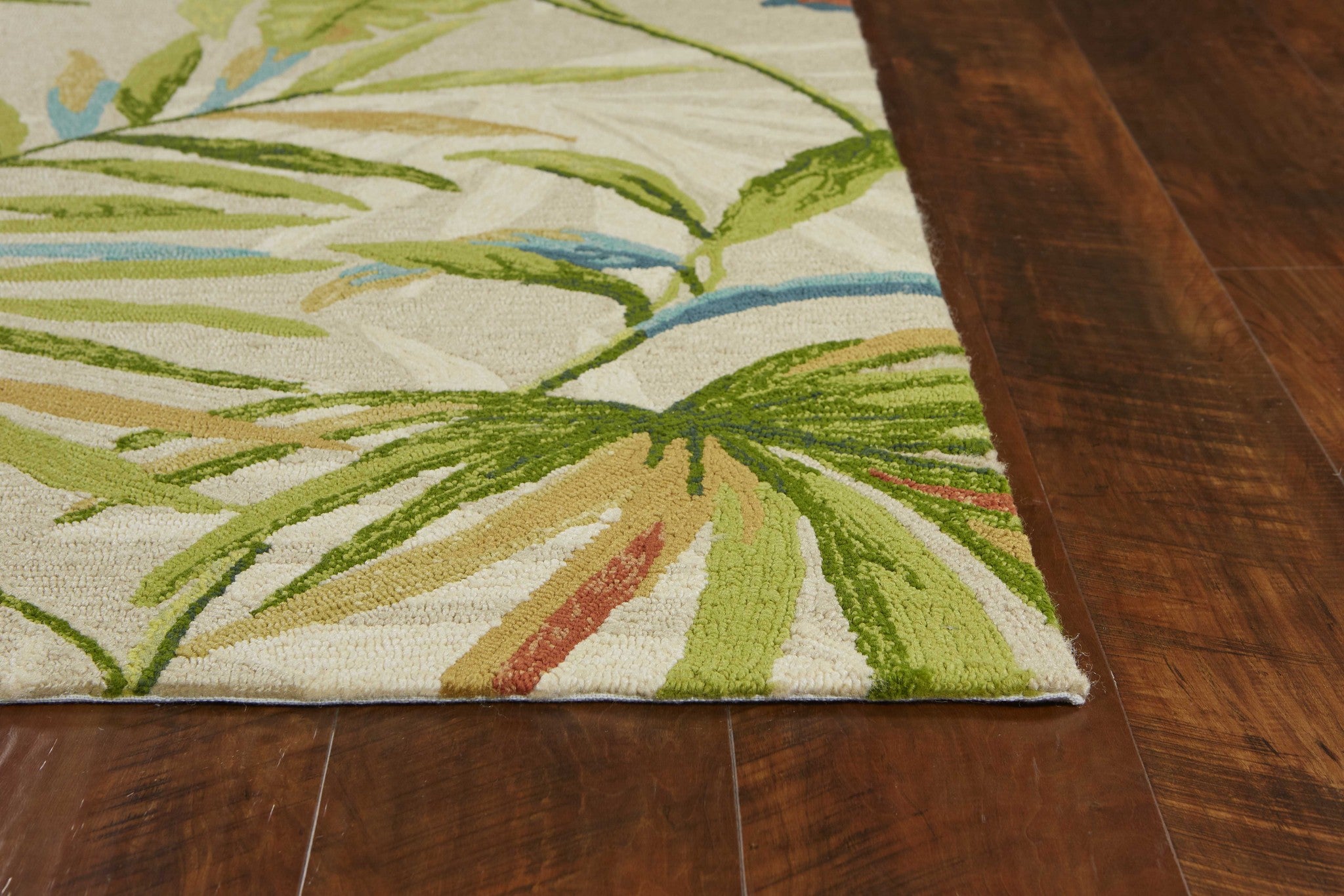 5x8 Sand Ivory Hand Woven UV Treated Palm Tropical Indoor Rug showcasing unique paint-dripping effects and layered designs.