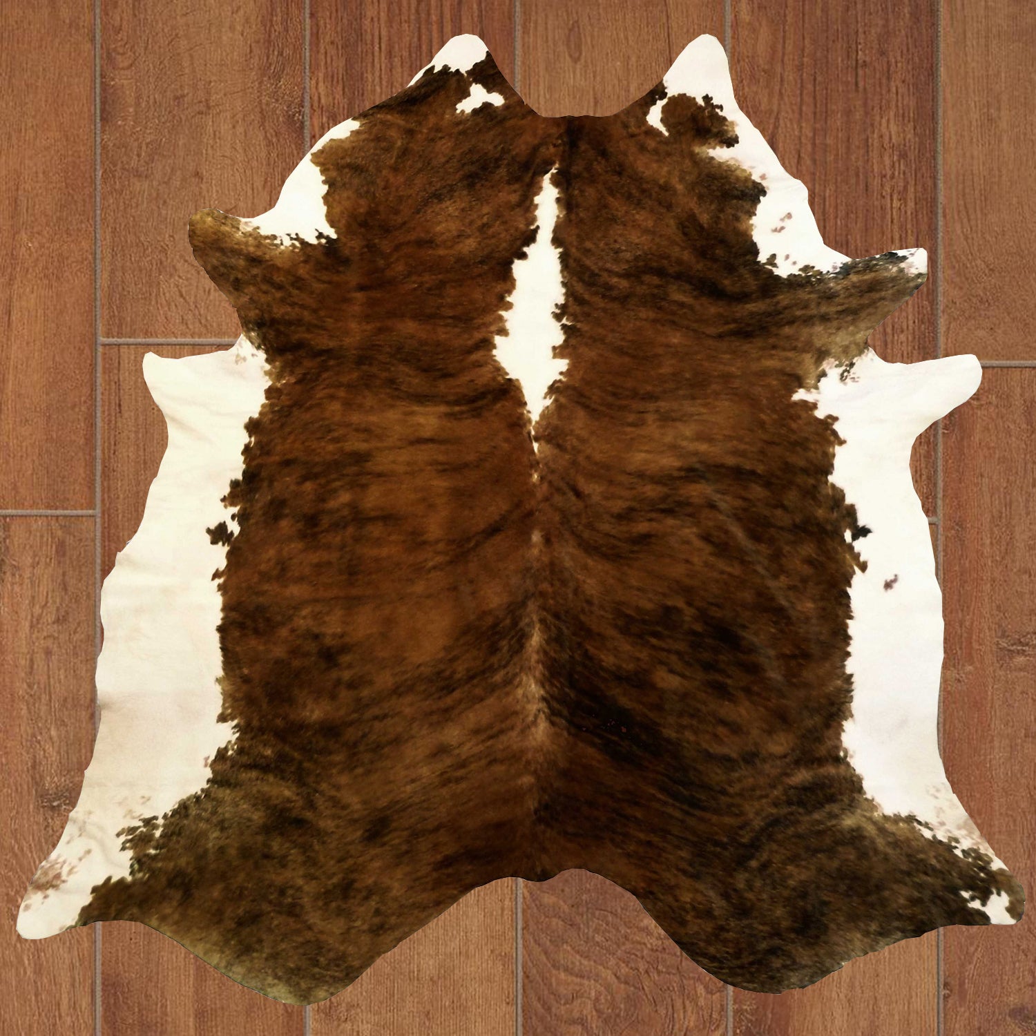 A beautiful 6 Ft Classic Brindled Cowhide Rug featuring a unique brown and white brindled pattern, perfect for enhancing home decor.