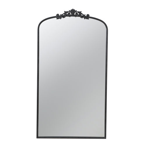 A stylish 66" x 36" full-length arched mirror with a black frame and regal adornment, perfect for hanging or leaning against a wall.