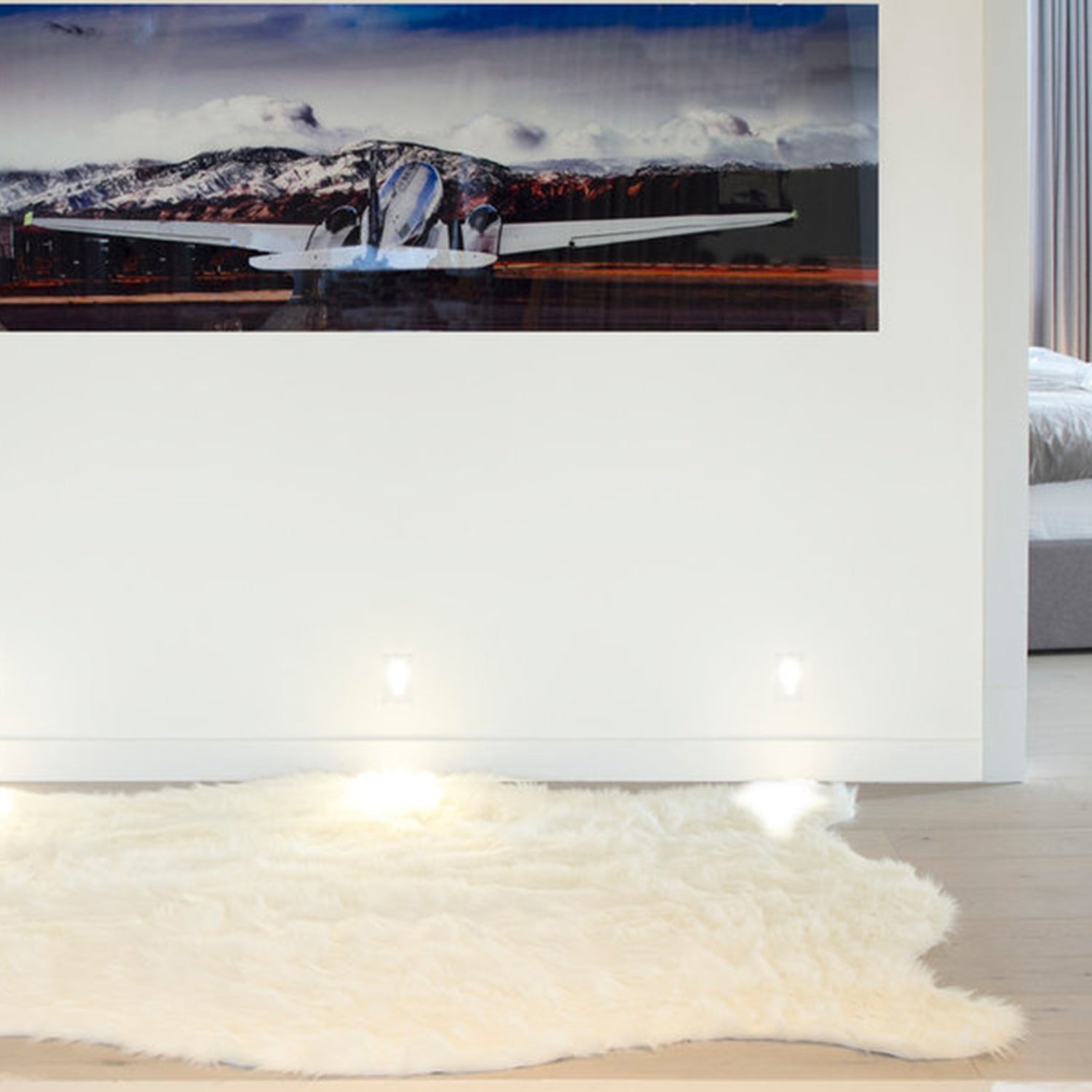 Luxurious off white faux sheepskin area rug measuring 60x72 inches, showcasing a plush texture and contemporary design.