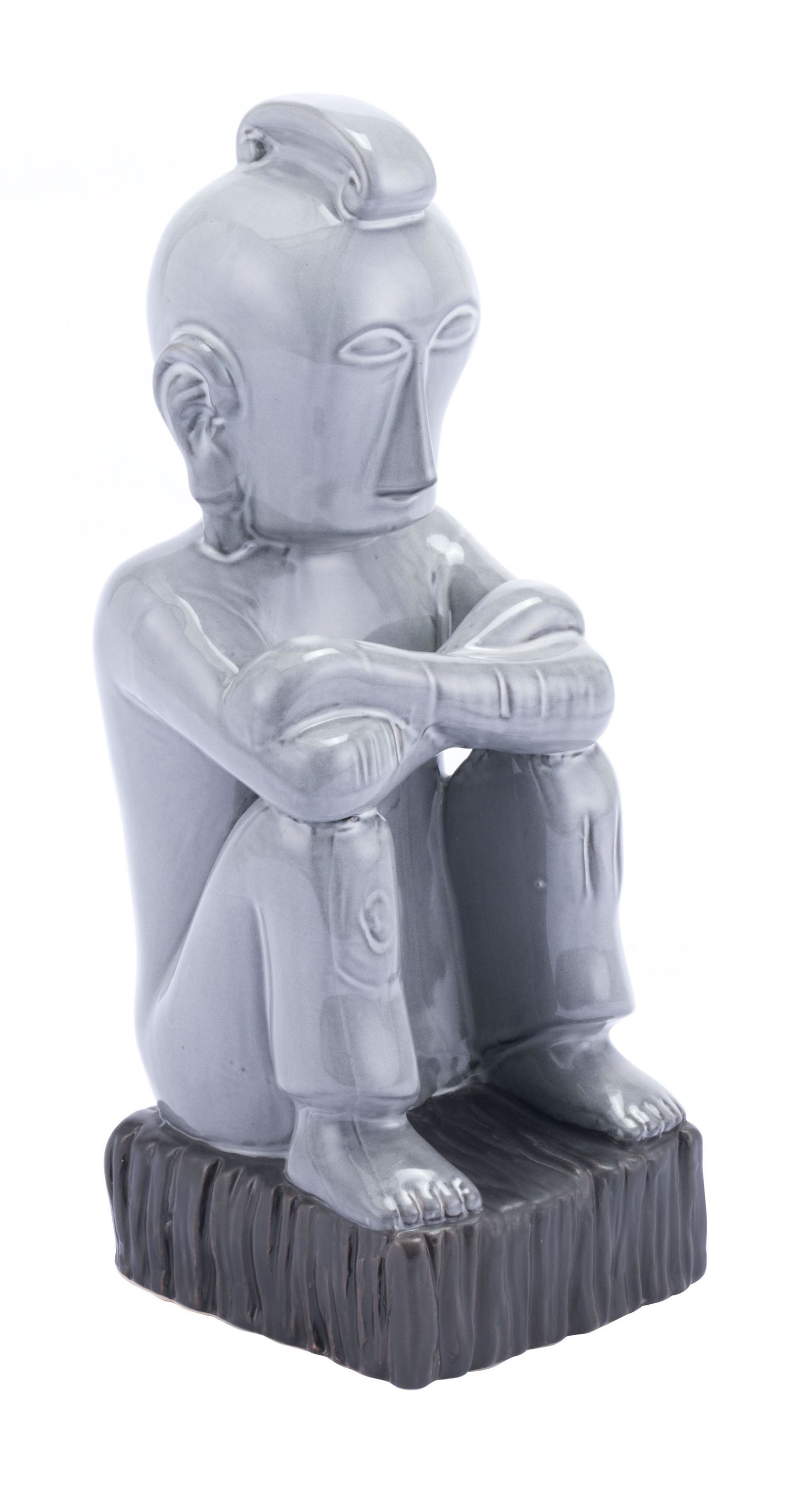 A tall gray ceramic figurine with a glossy finish and a matte black base, symbolizing nature and elegance.