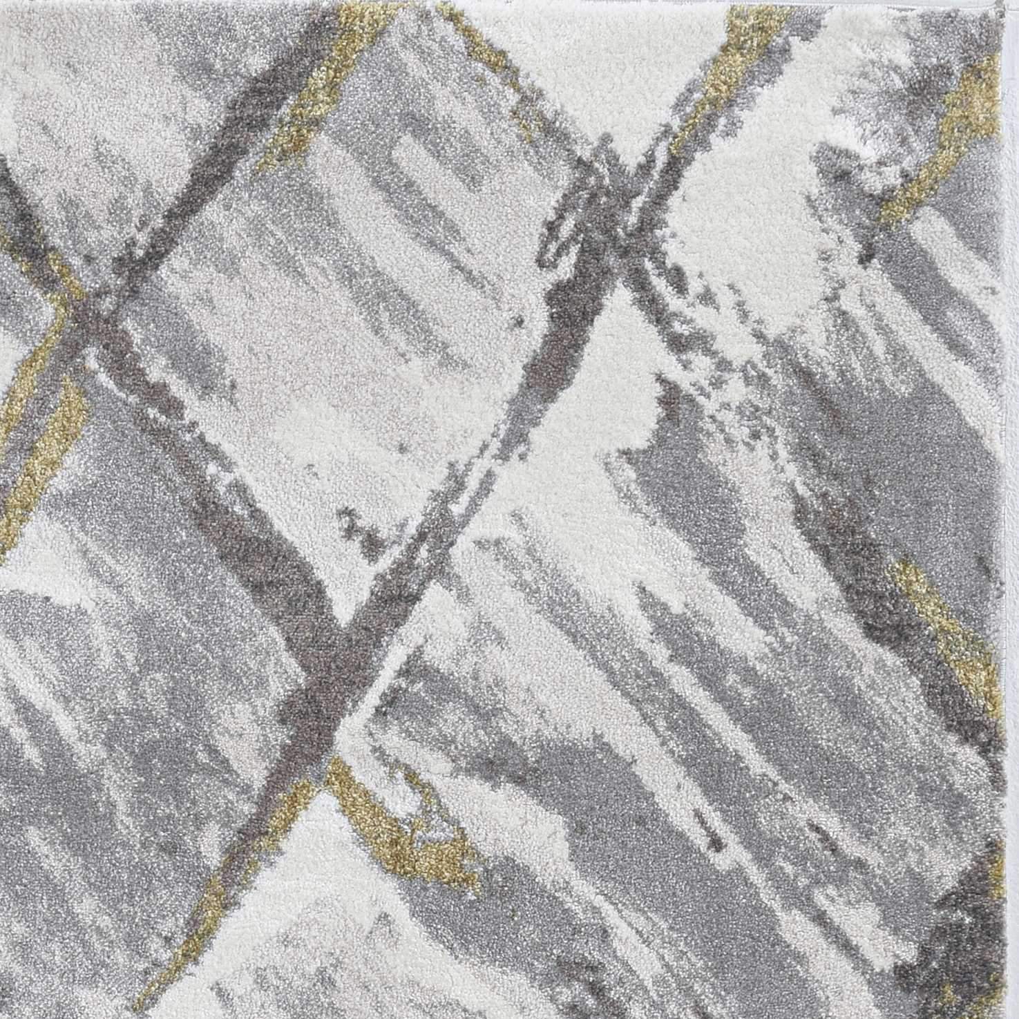 A luxurious 63" X 91" ivory and grey polyester rug featuring unique geod patterns and plush fibers, perfect for enhancing any room's decor.