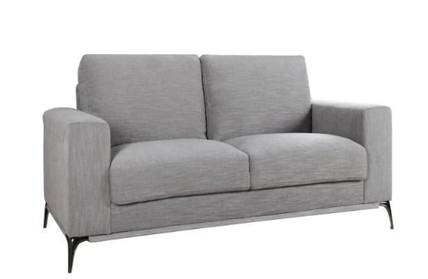 A stylish 65" X 39" X 35" beige polyester loveseat with track arms and tapered zinc legs, perfect for modern living spaces.