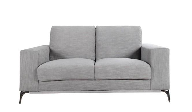 A stylish 65" X 39" X 35" beige polyester loveseat with track arms and tapered zinc legs, perfect for modern living spaces.