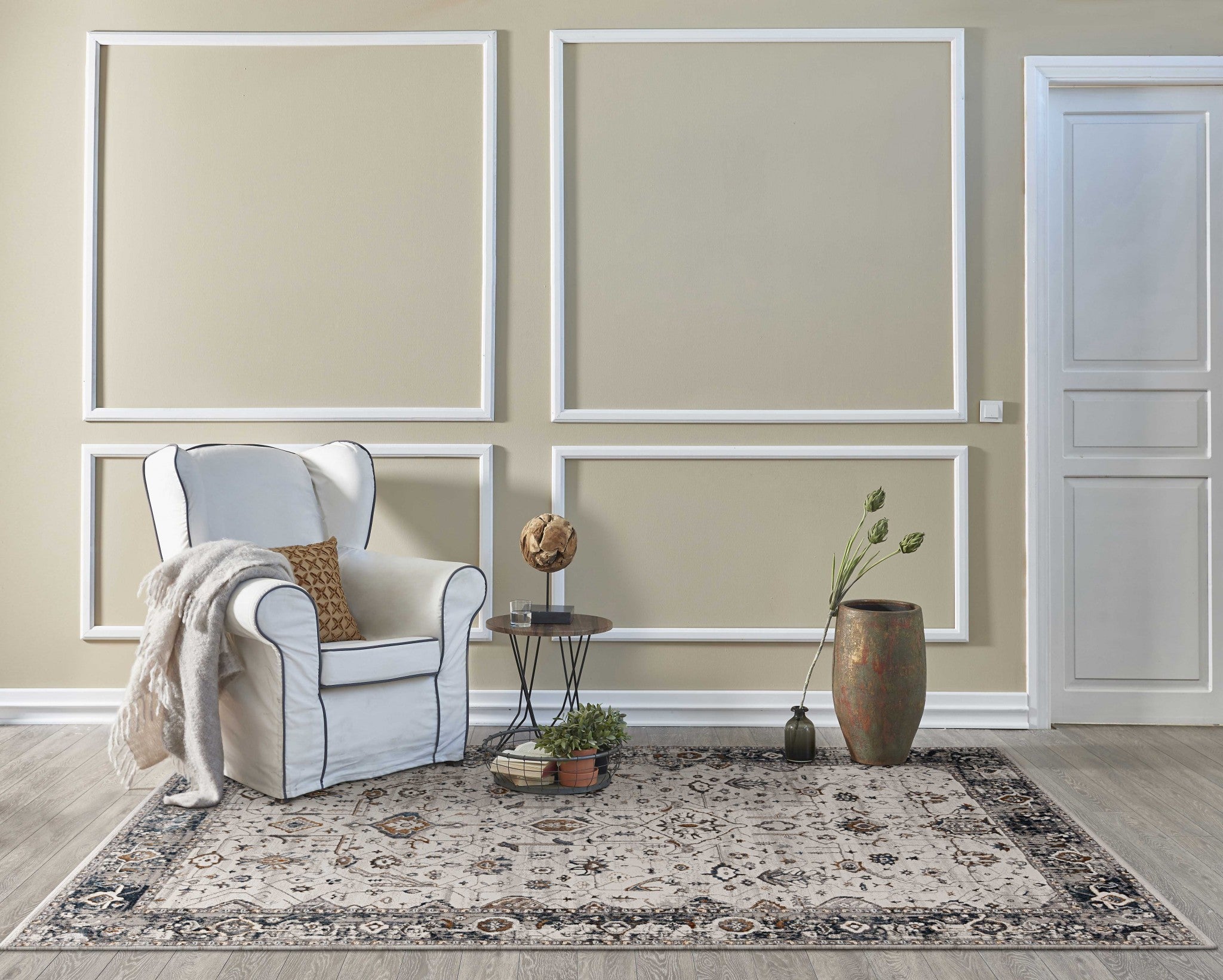 6x9 inches ivory and grey floral vine bordered indoor area rug with metallic highlights, perfect for living rooms.