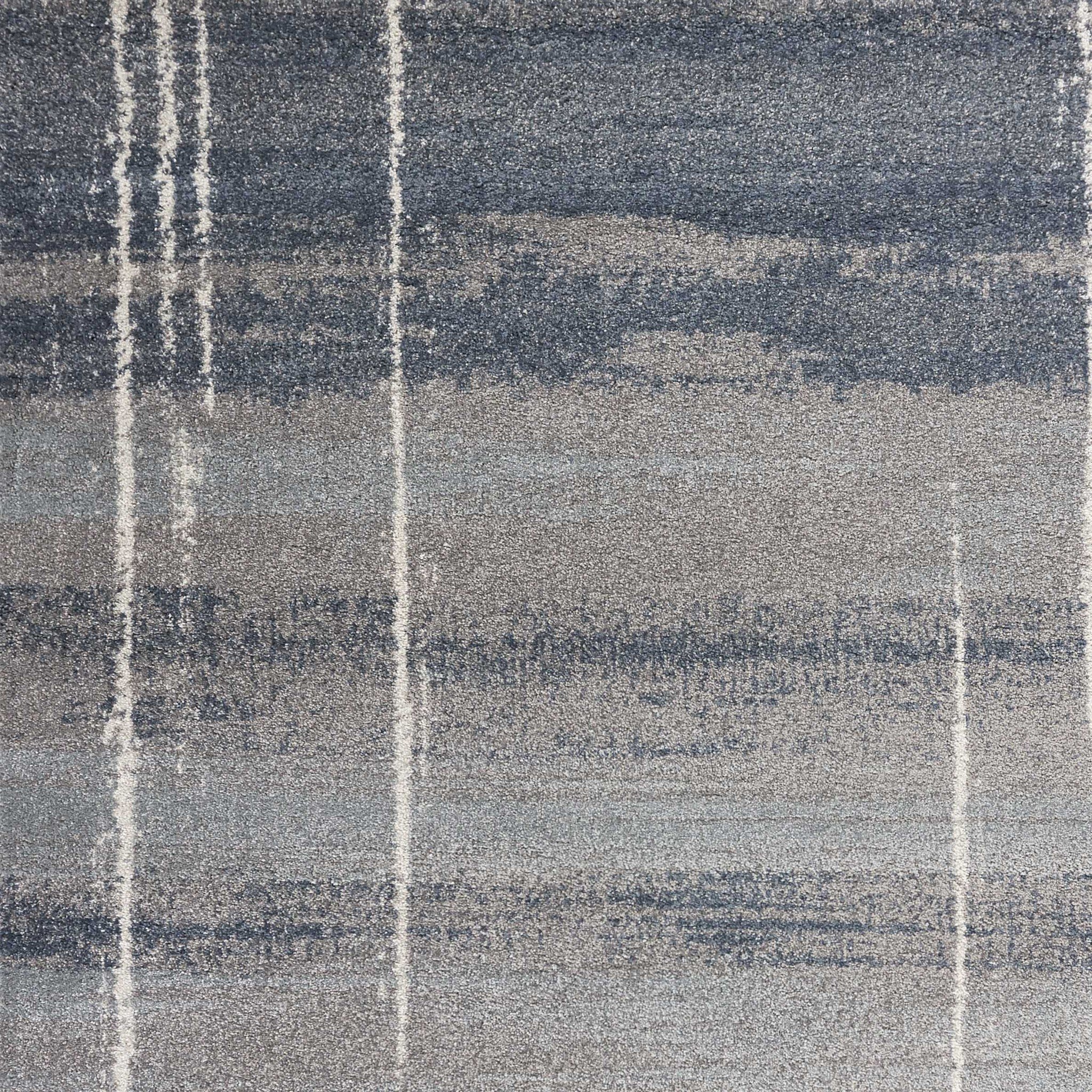 A beautiful 7 x 10 blue polypropylene area rug with a contemporary design, perfect for enhancing living spaces.